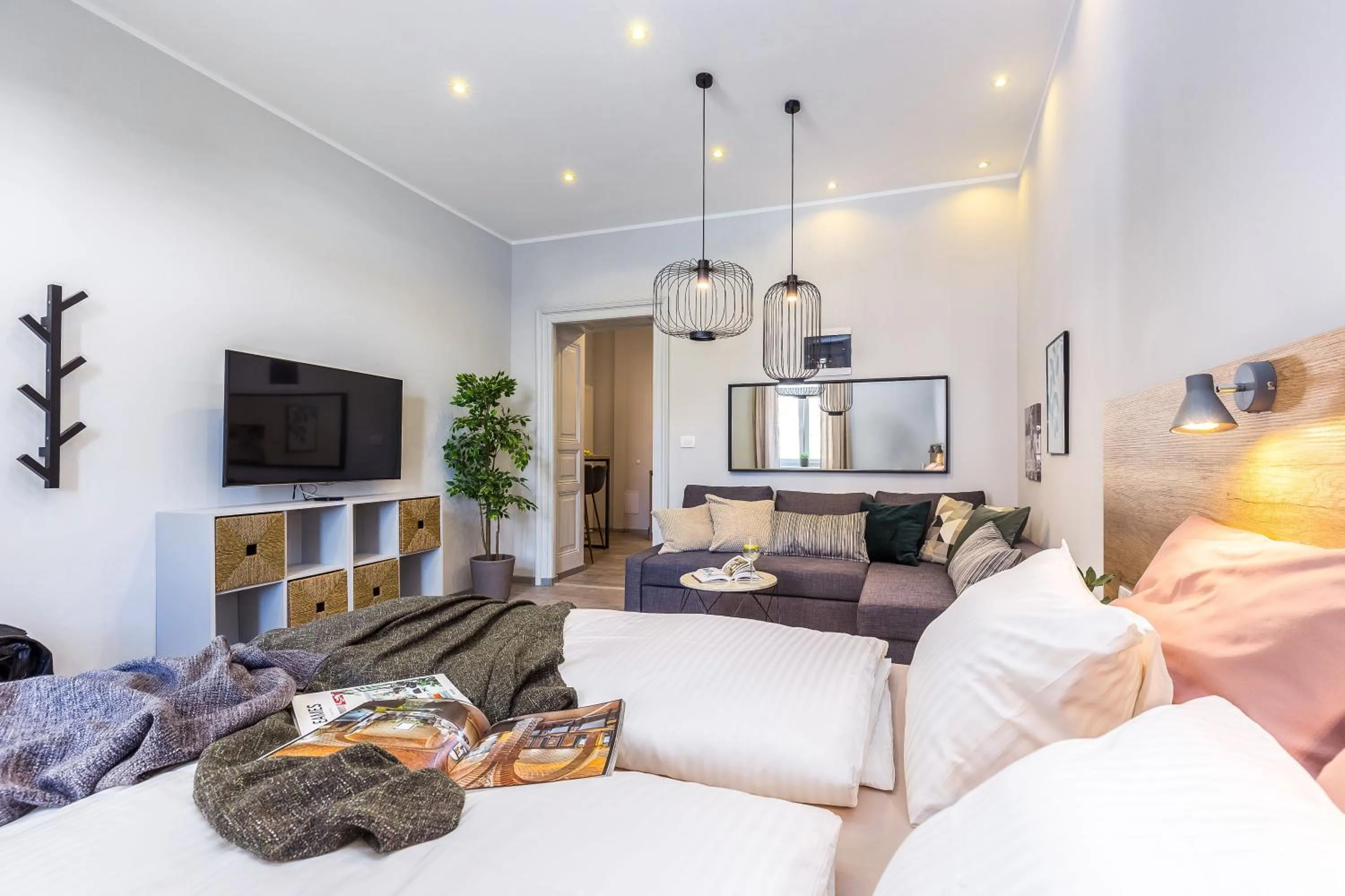 Living room, Bed in Number 1 Deluxe Apartments