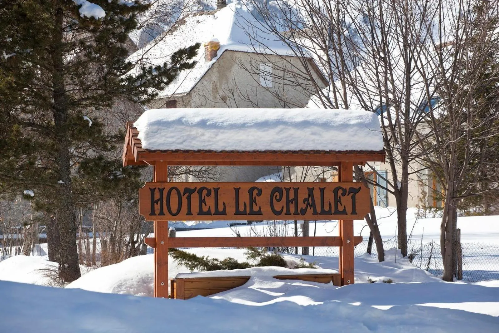 Property logo or sign in Hotel le Chalet