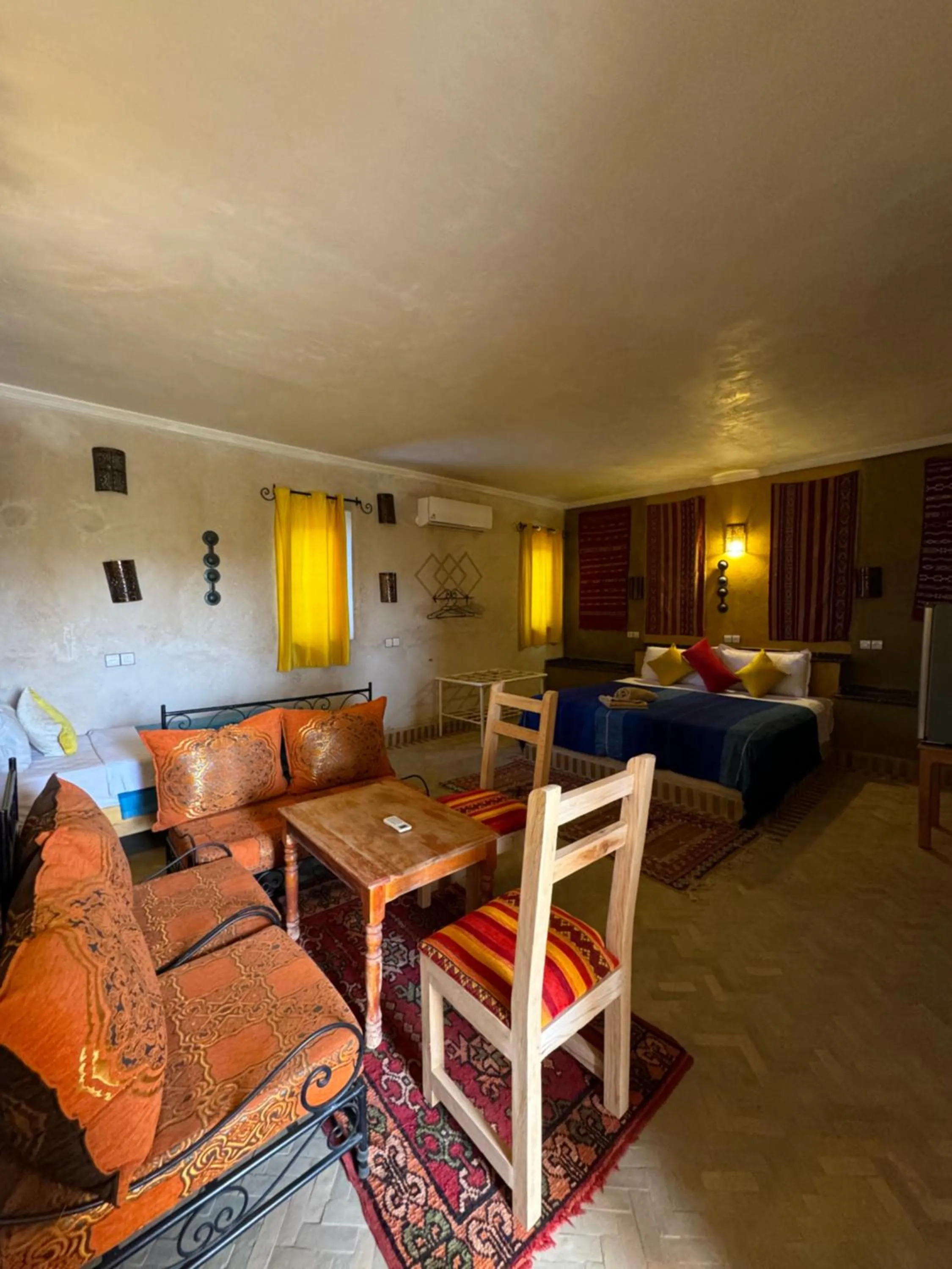 Seating area, Bed in Maison Merzouga Guest House