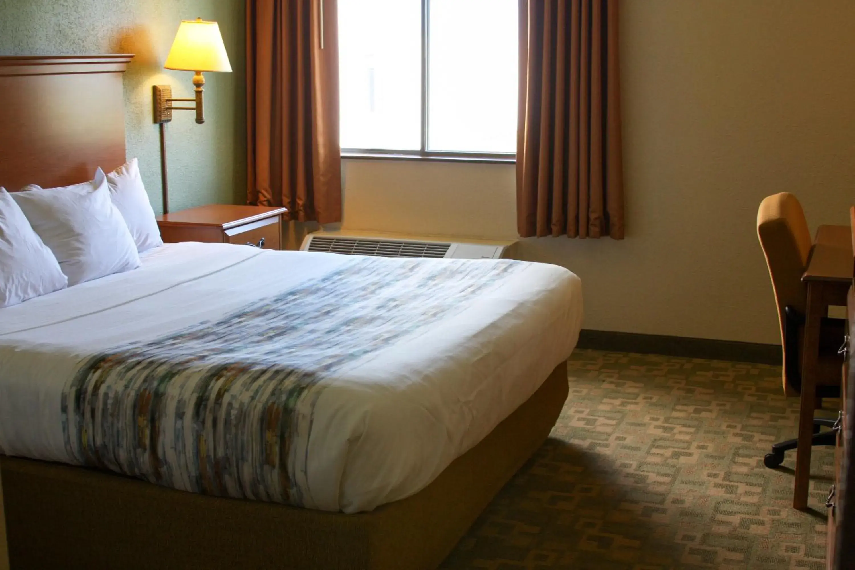 Bed in Barkers Island Inn Resort & Conference Center Bed in Barkers Island Inn Resort & Conference Center