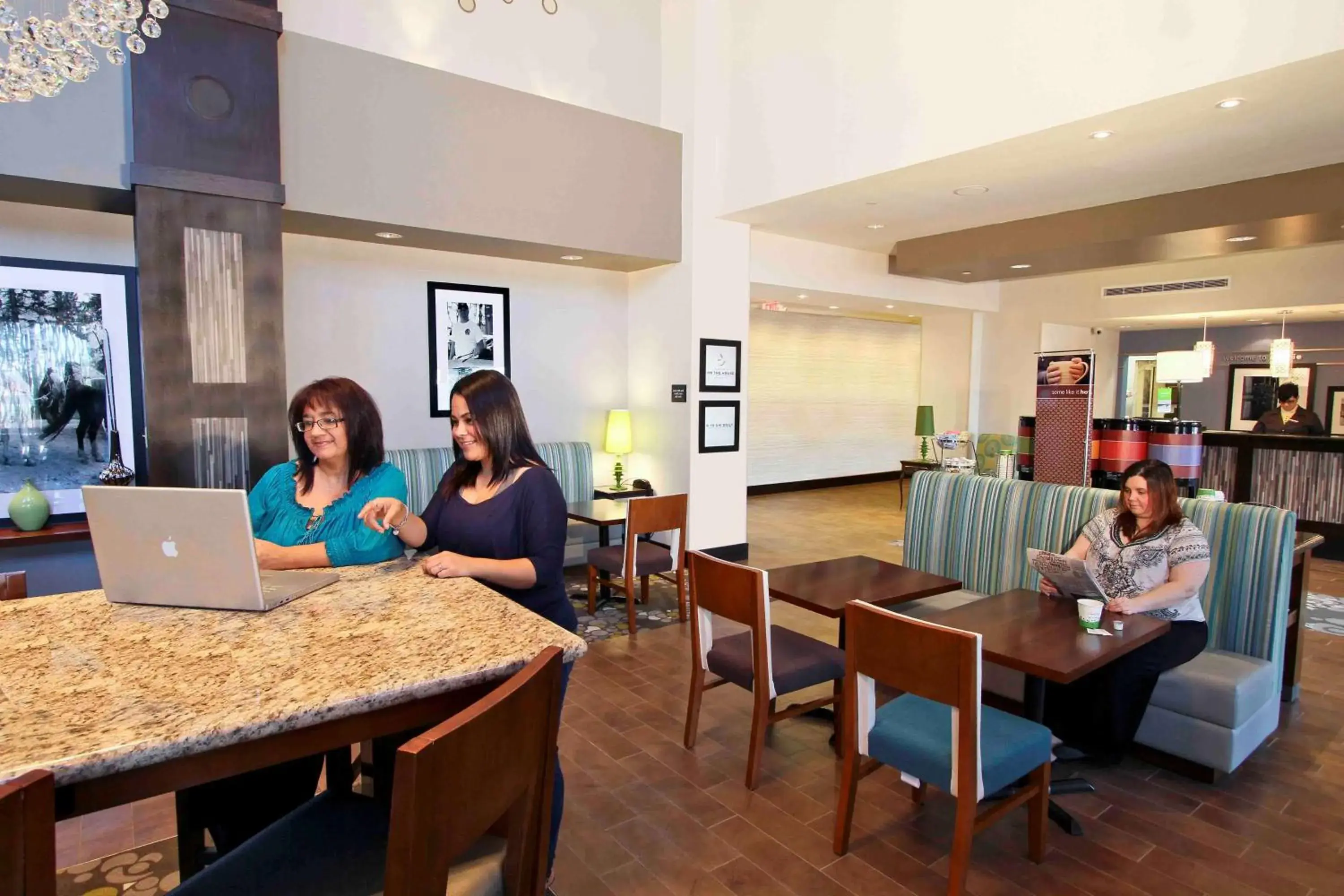 Lobby or reception in Hampton Inn & Suites Winnie Lobby or reception in Hampton Inn & Suites Winnie