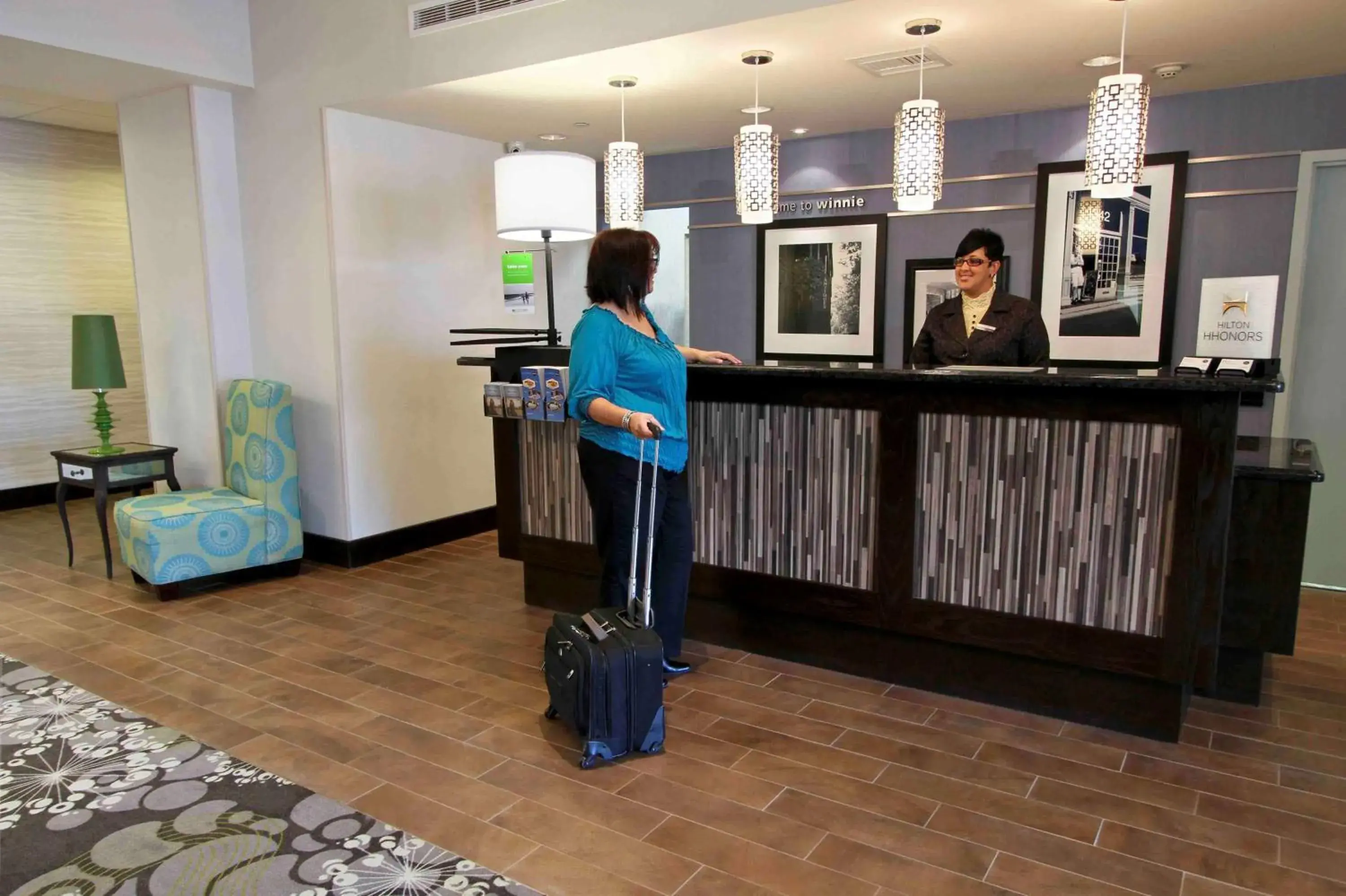 Lobby or reception in Hampton Inn & Suites Winnie Lobby or reception in Hampton Inn & Suites Winnie