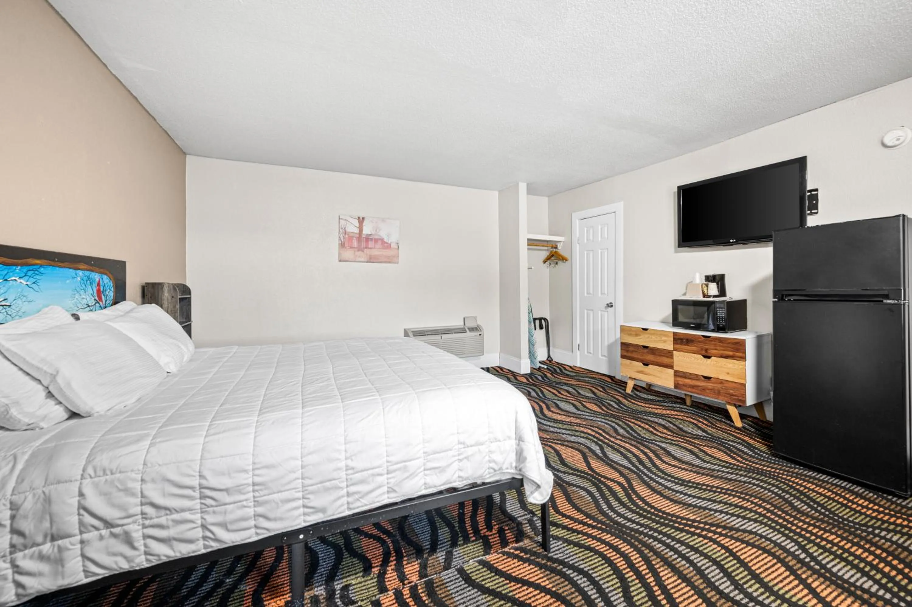 Bed in Country Town N' Suites