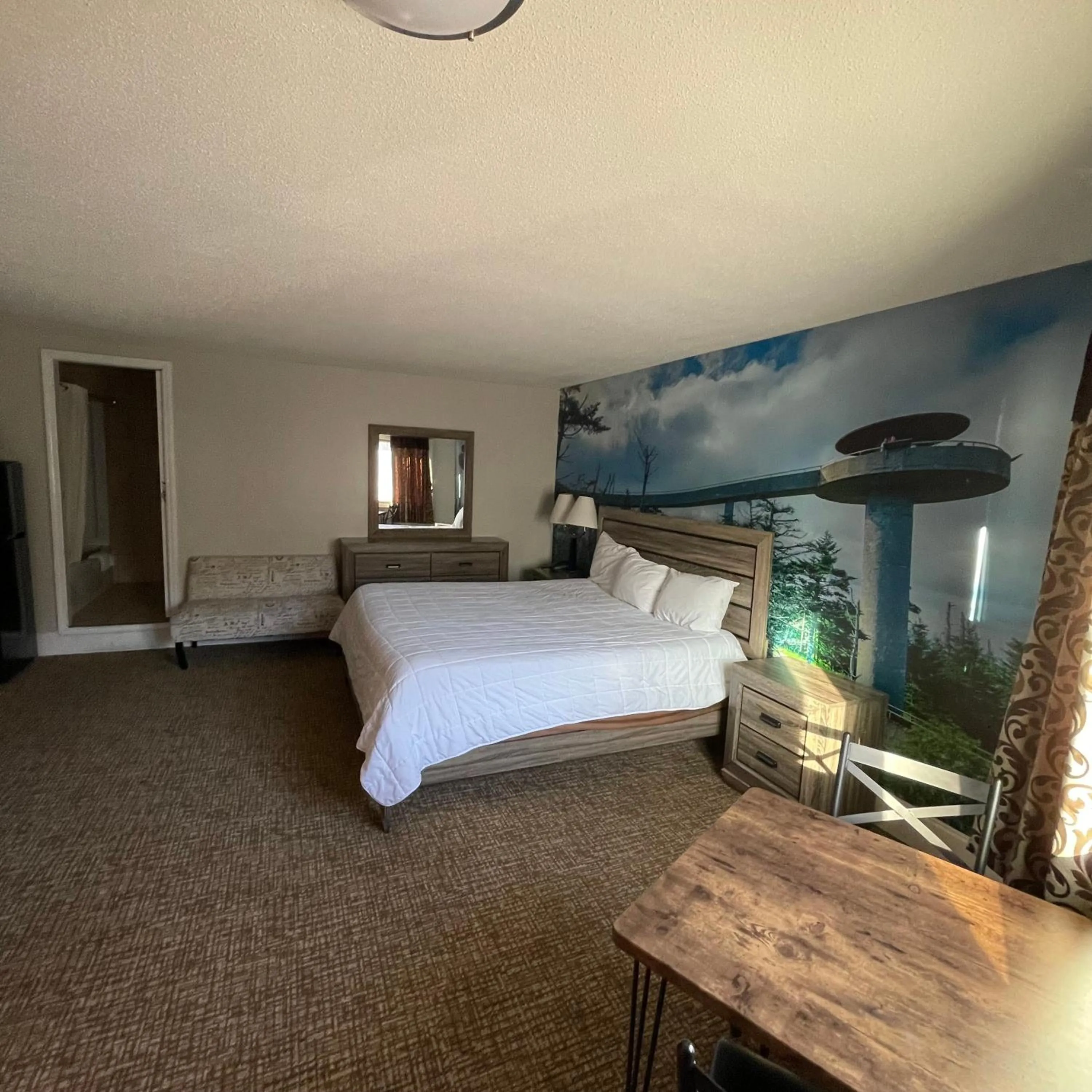 Photo of the whole room, Bed in Country Town N' Suites