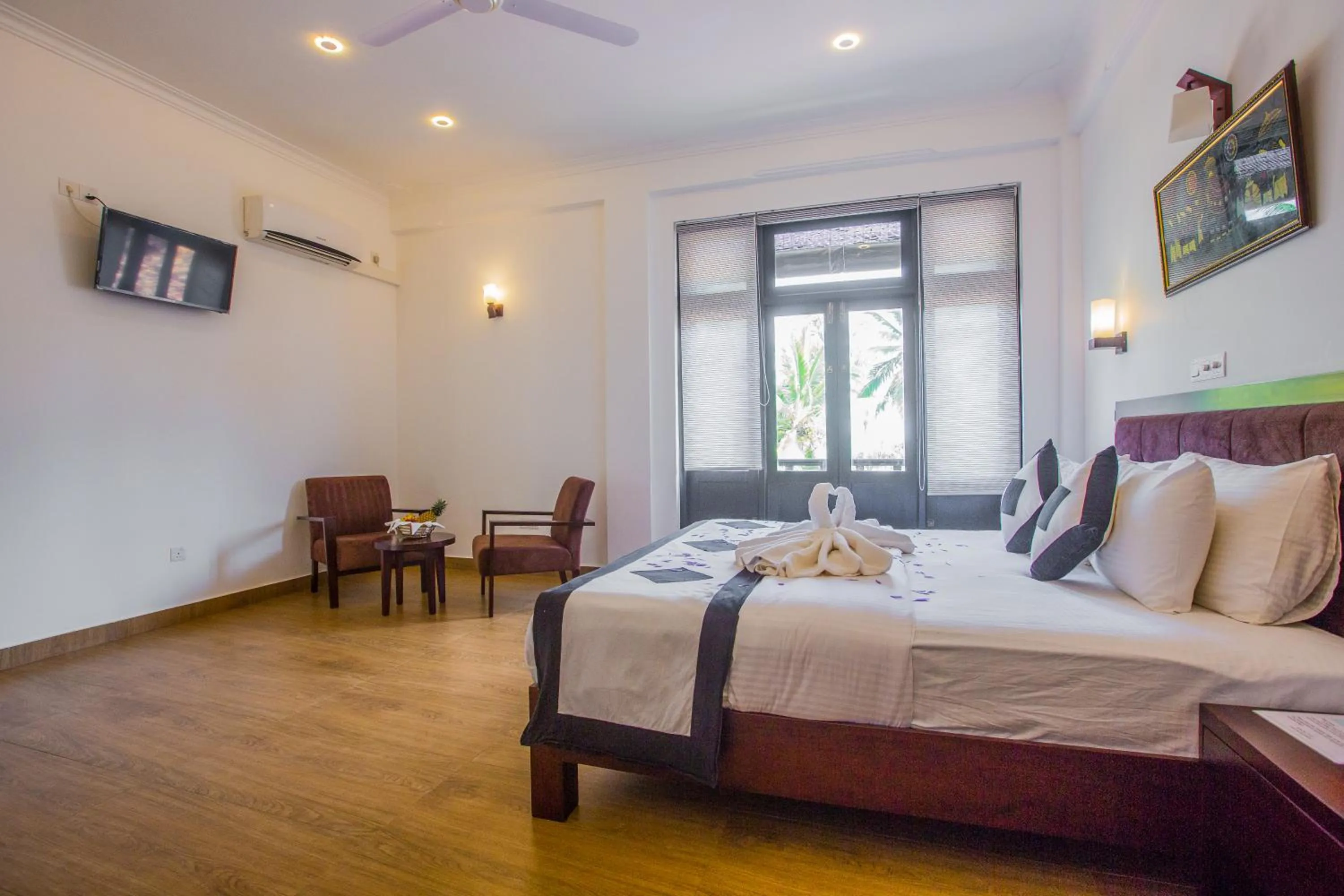 Toilet, Bed in Villa Tissa Beach Resort