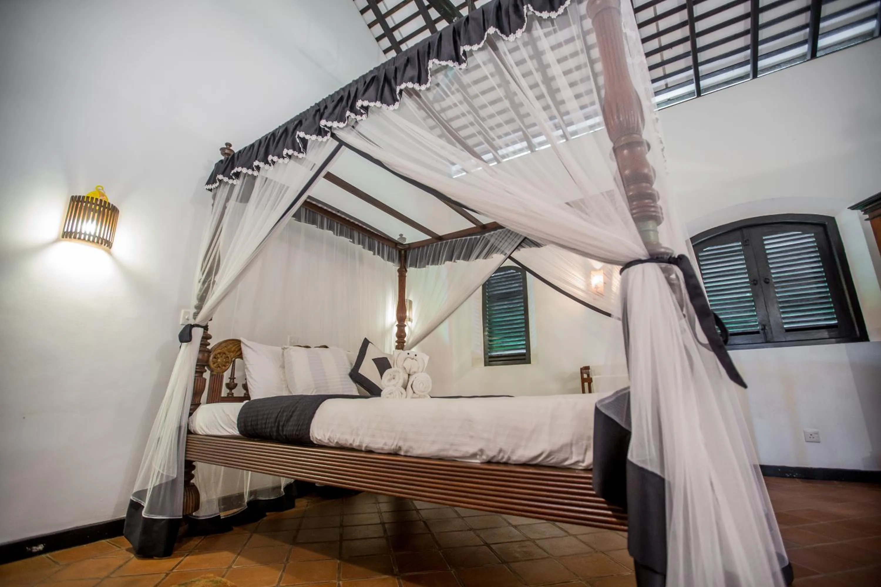 Bed in Villa Tissa Beach Resort