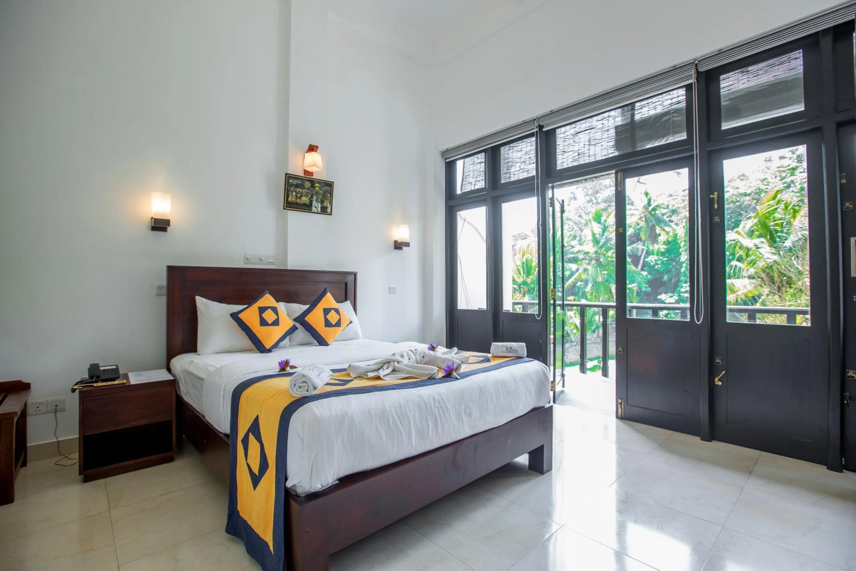 Bed in Villa Tissa Beach Resort