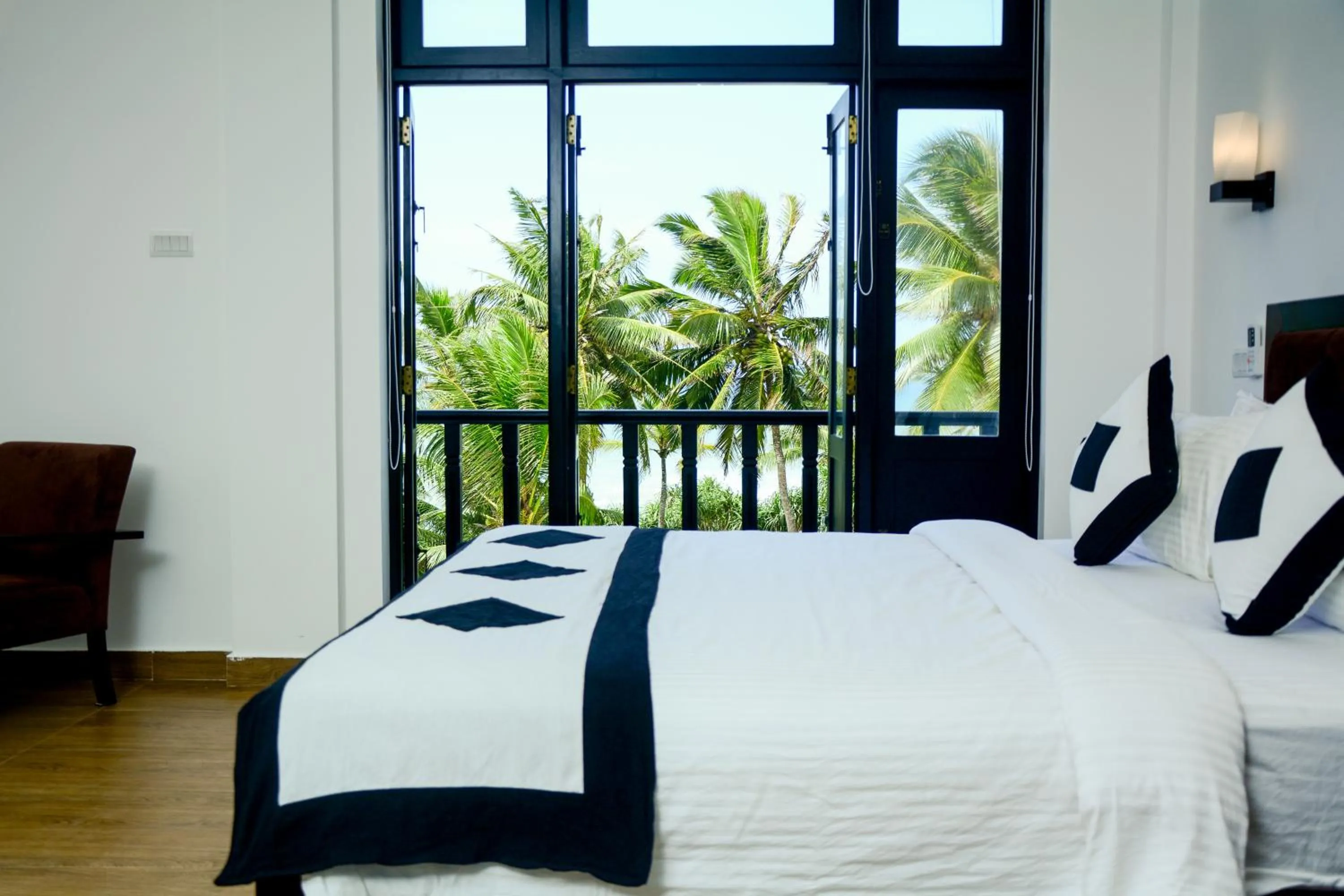 Bed in Villa Tissa Beach Resort