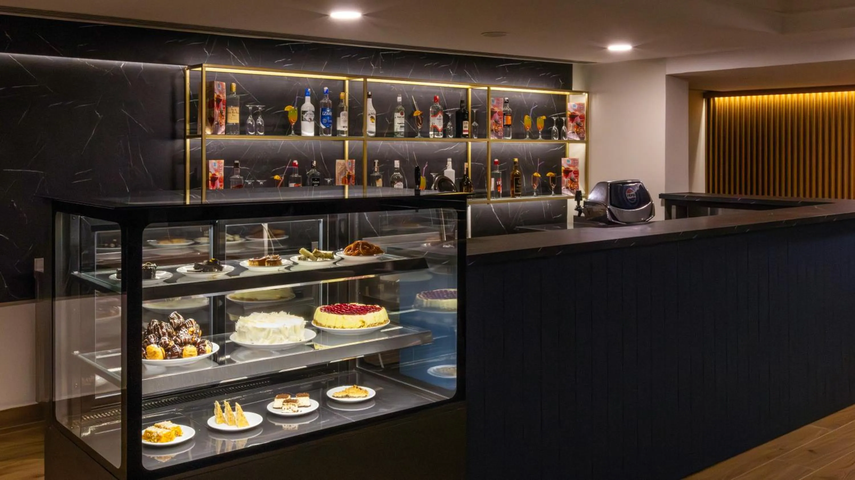 Communal lounge/ TV room in Palmin Hotel