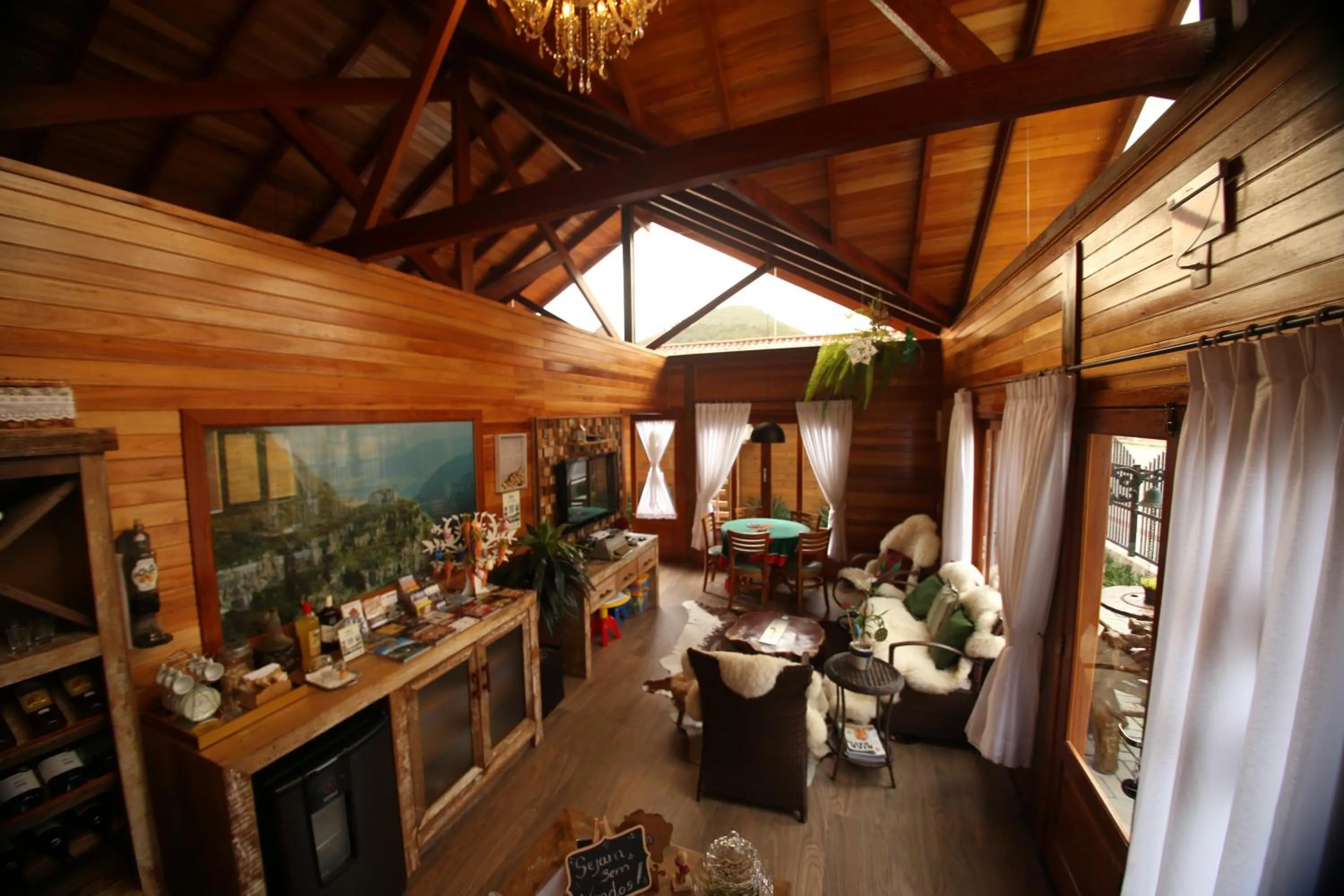 Living room in Pousada Vila dos Butias