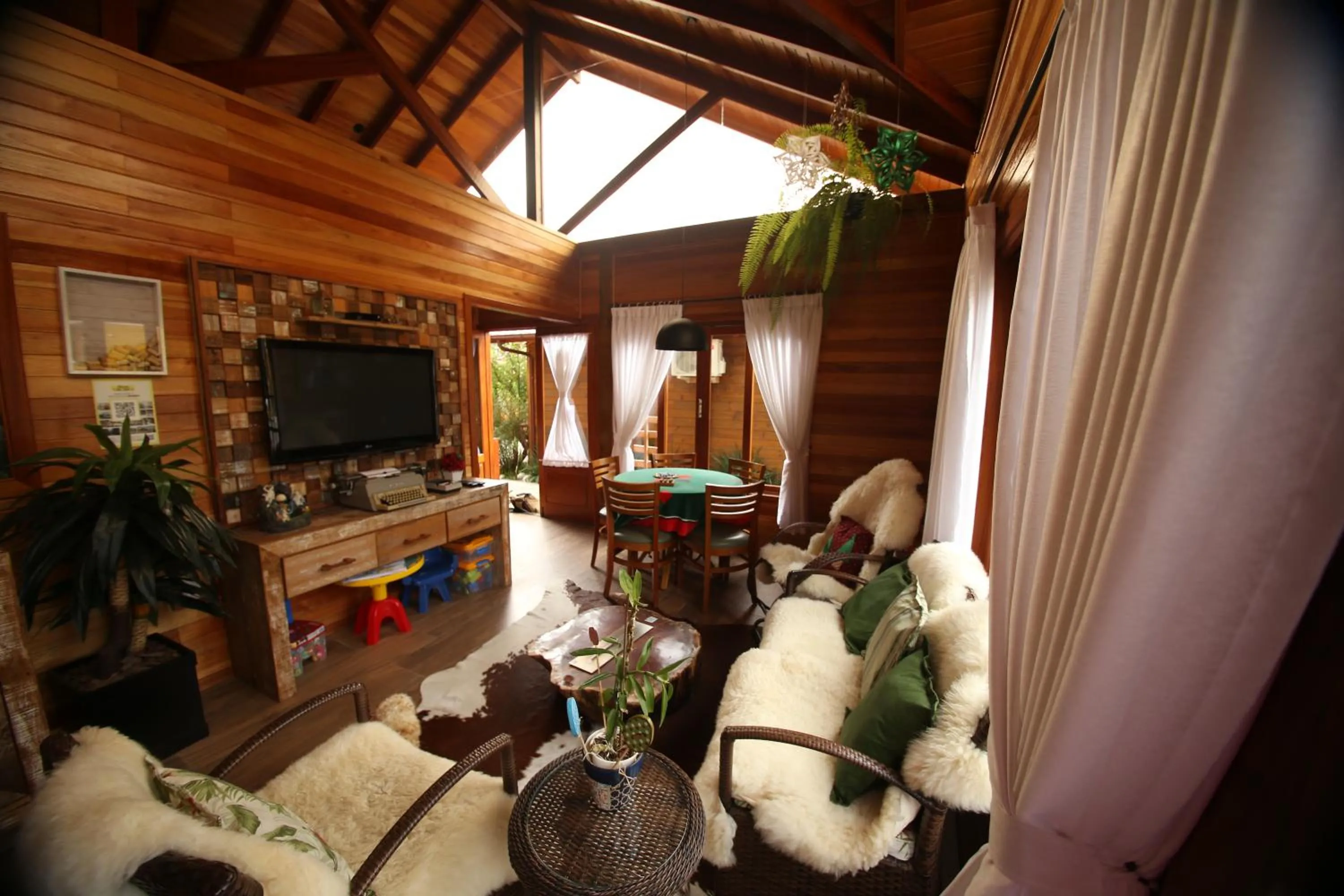 Living room in Pousada Vila dos Butias