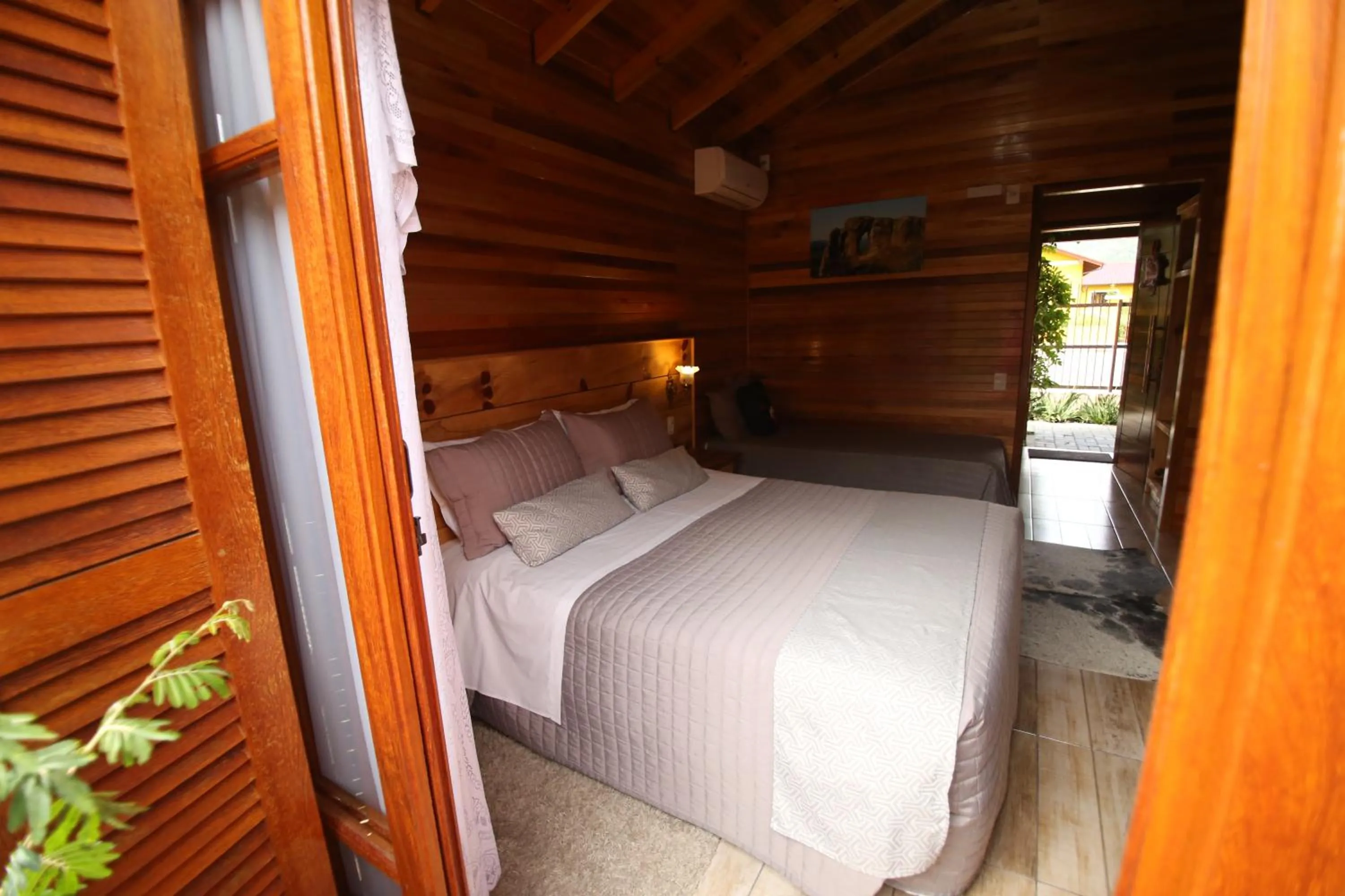 Photo of the whole room, Bed in Pousada Vila dos Butias
