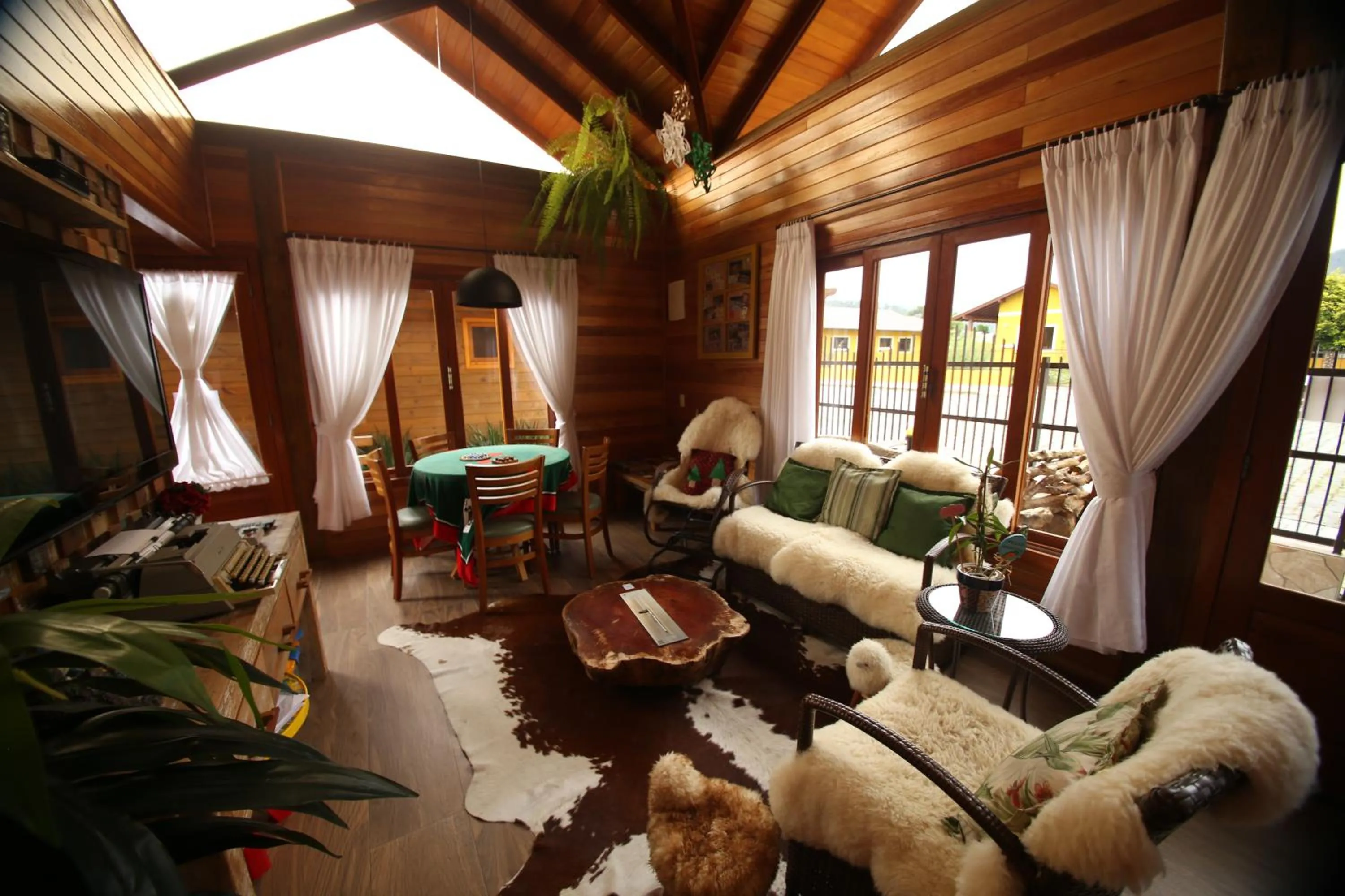 Living room in Pousada Vila dos Butias