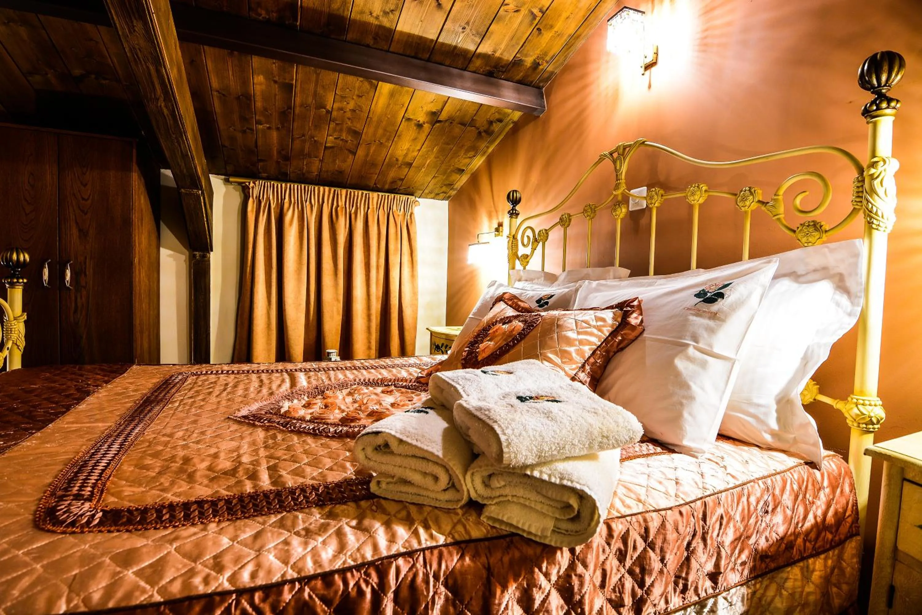 Bed in Camelia Suites