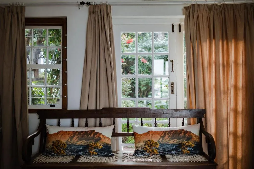 Bed in Radium Hall Guest House