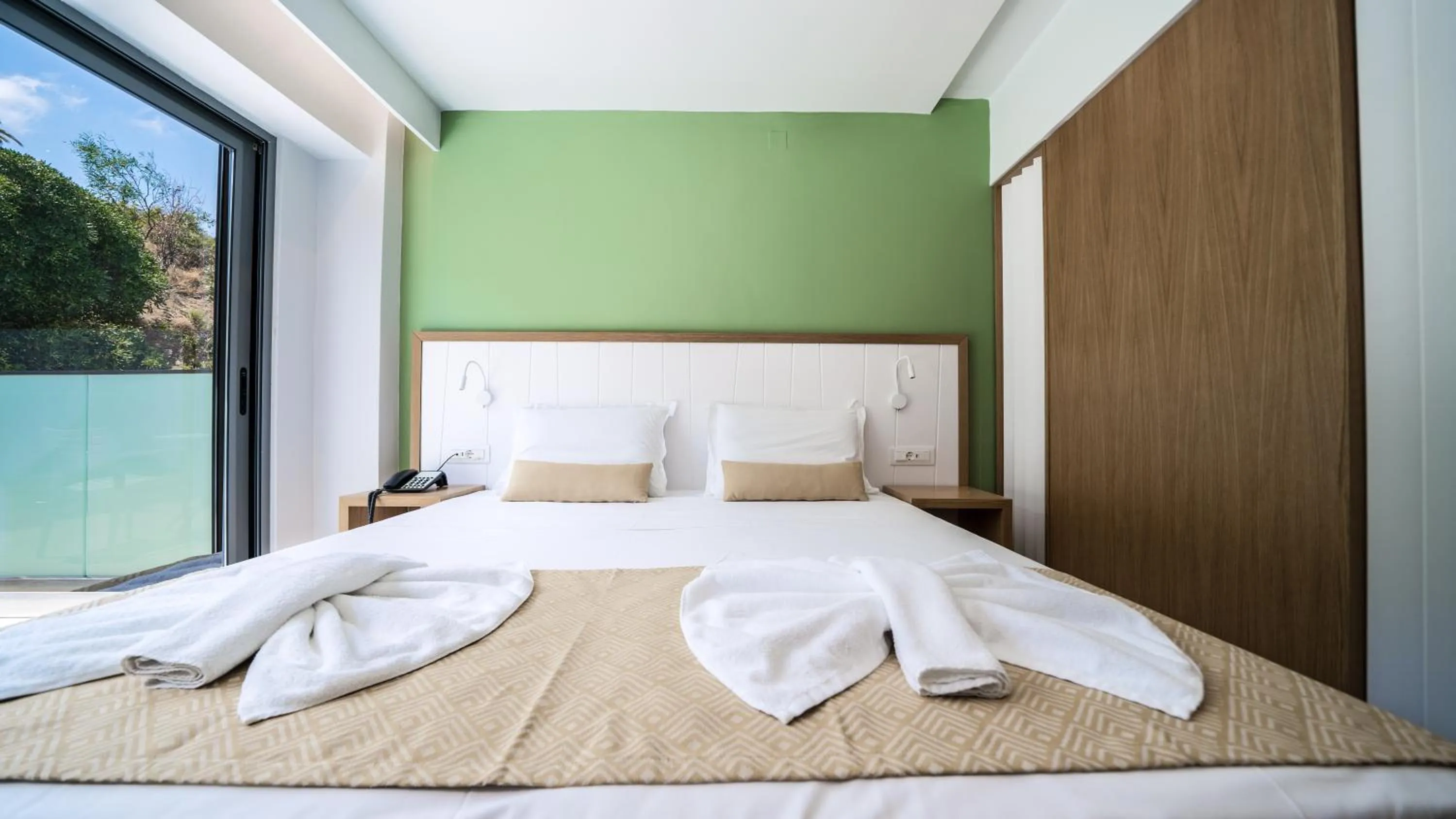 Bedroom in Panorama Village Hotel