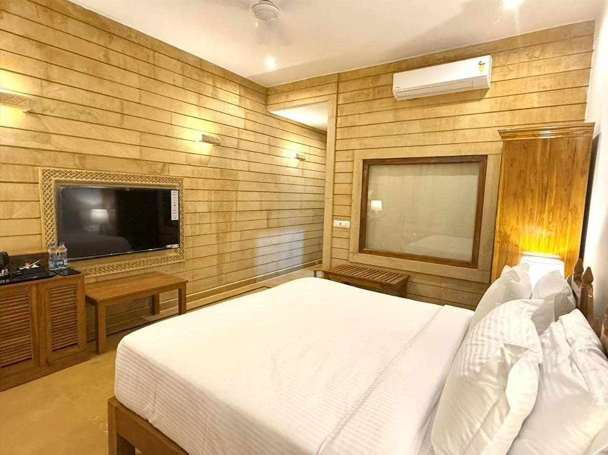 Bed in Hotel Golden Haveli