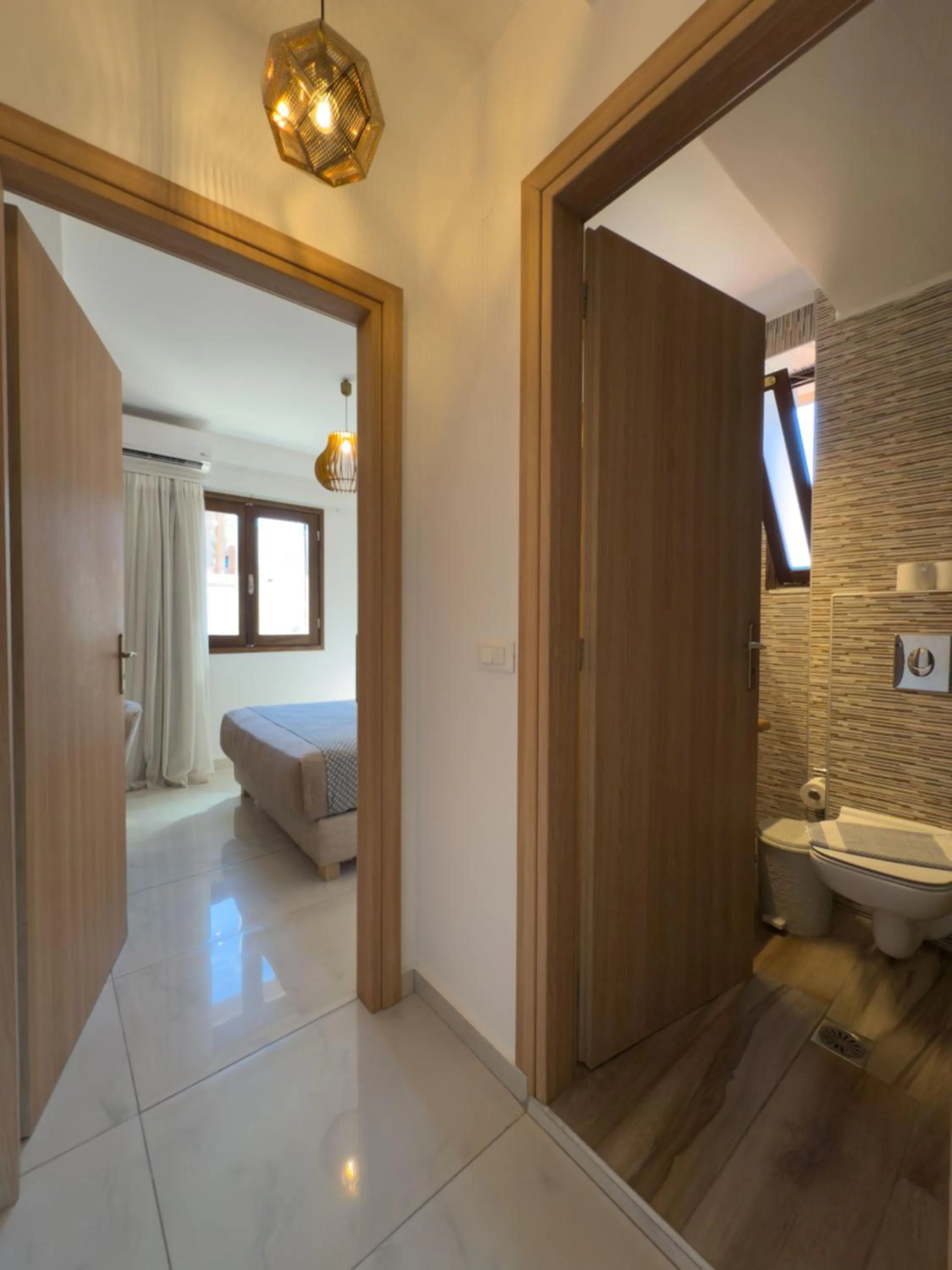 Photo of the whole room, Bed in Deluxe Suites