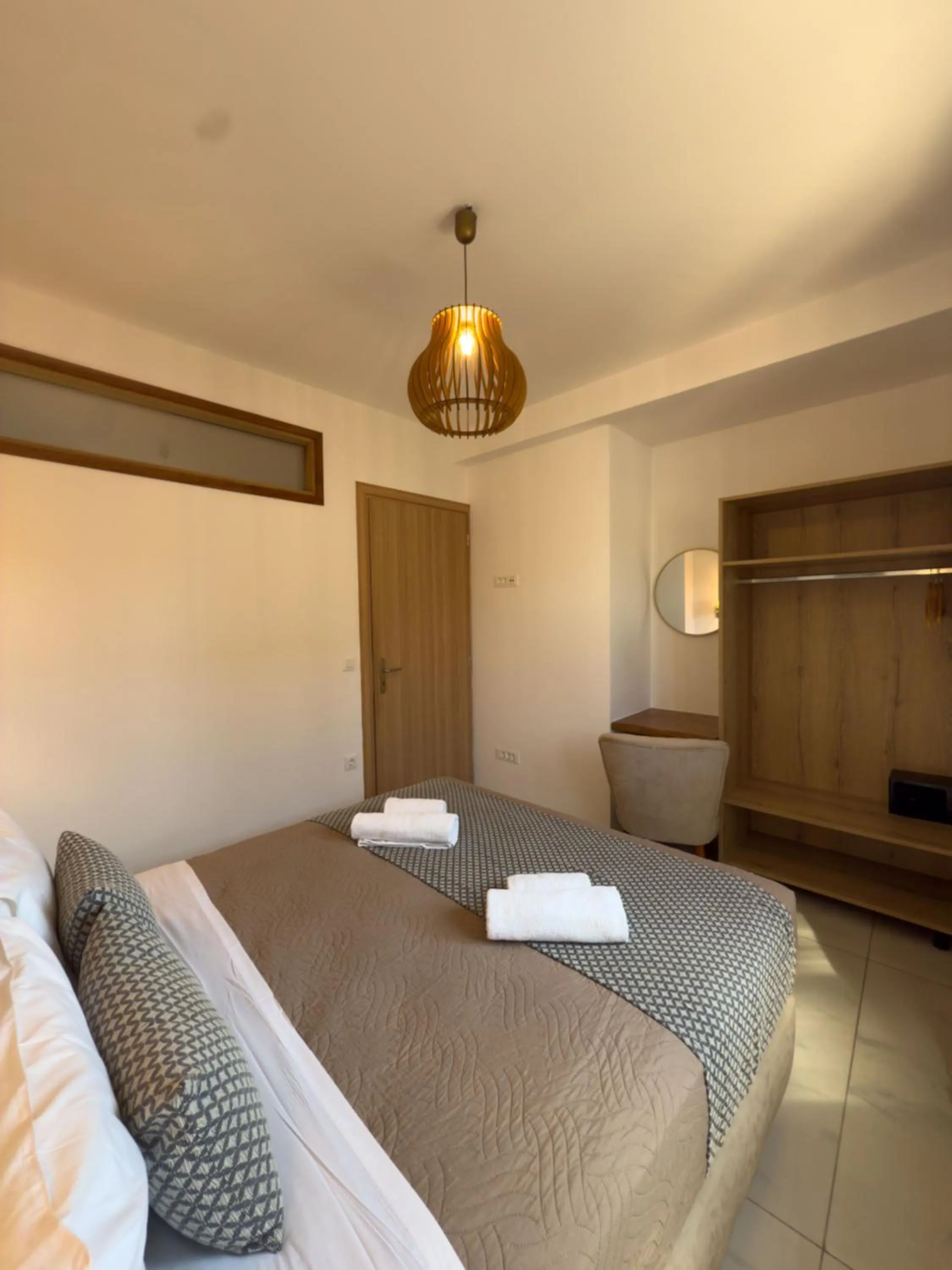 Bedroom, Bed in Deluxe Suites