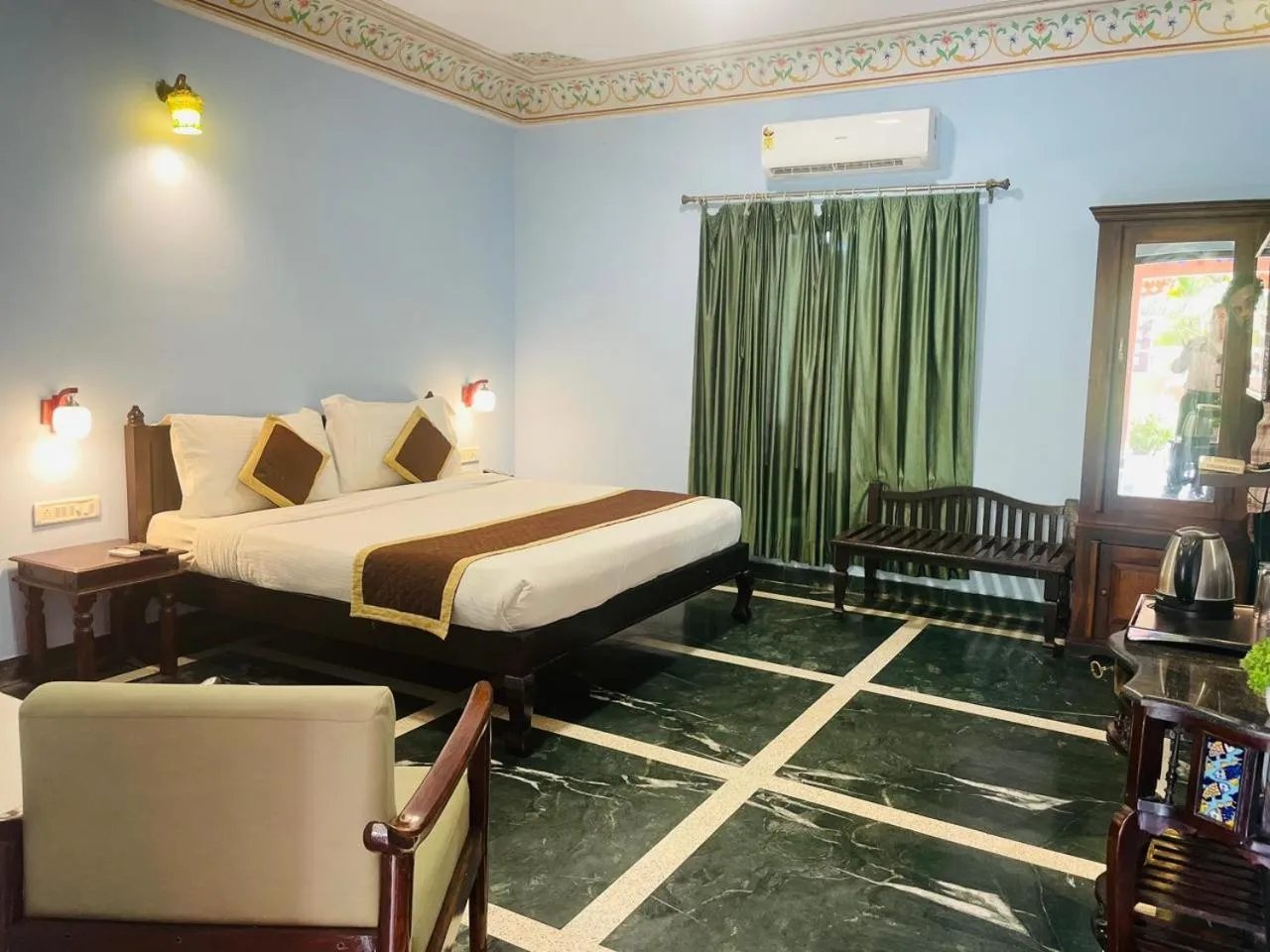 Bed in Sajjan Bagh Resort