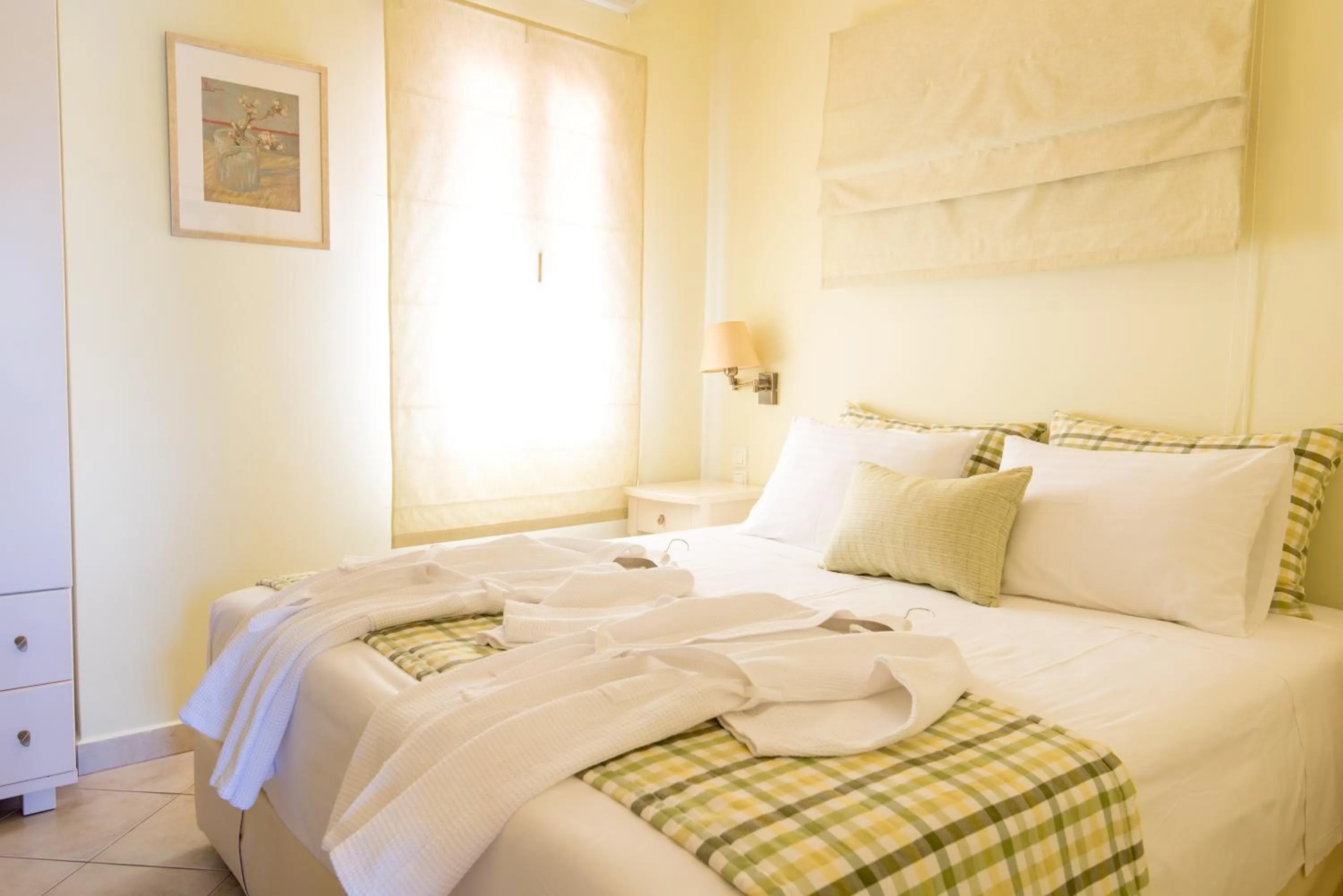 Bed in Myrties Boutique Apartments