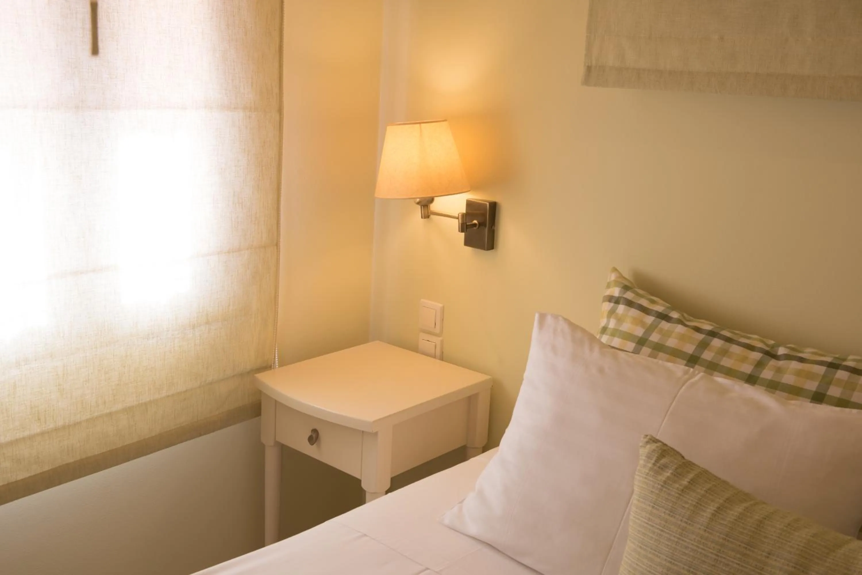 Bed in Myrties Boutique Apartments