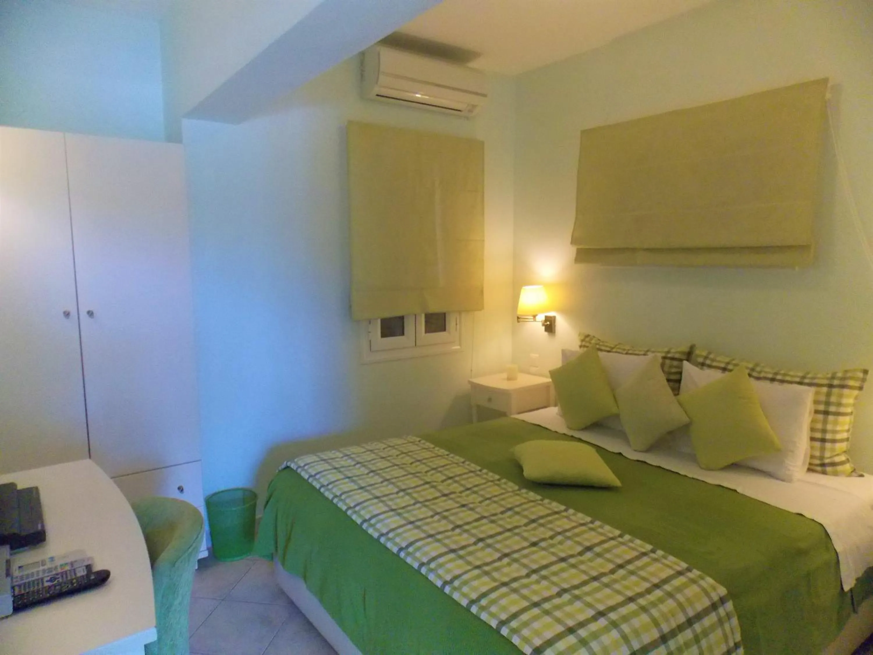 Bed in Myrties Boutique Apartments