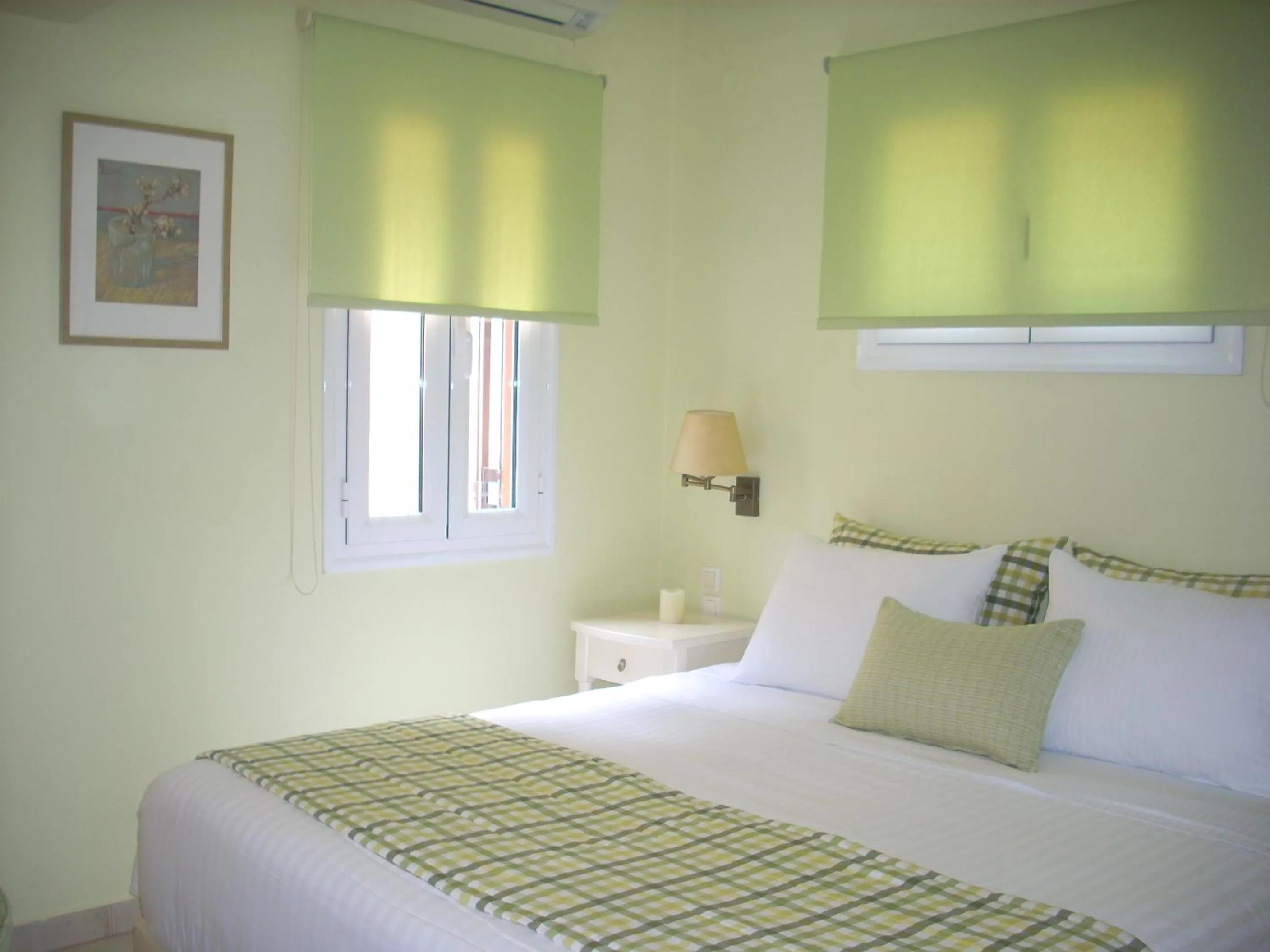 Bed in Myrties Boutique Apartments