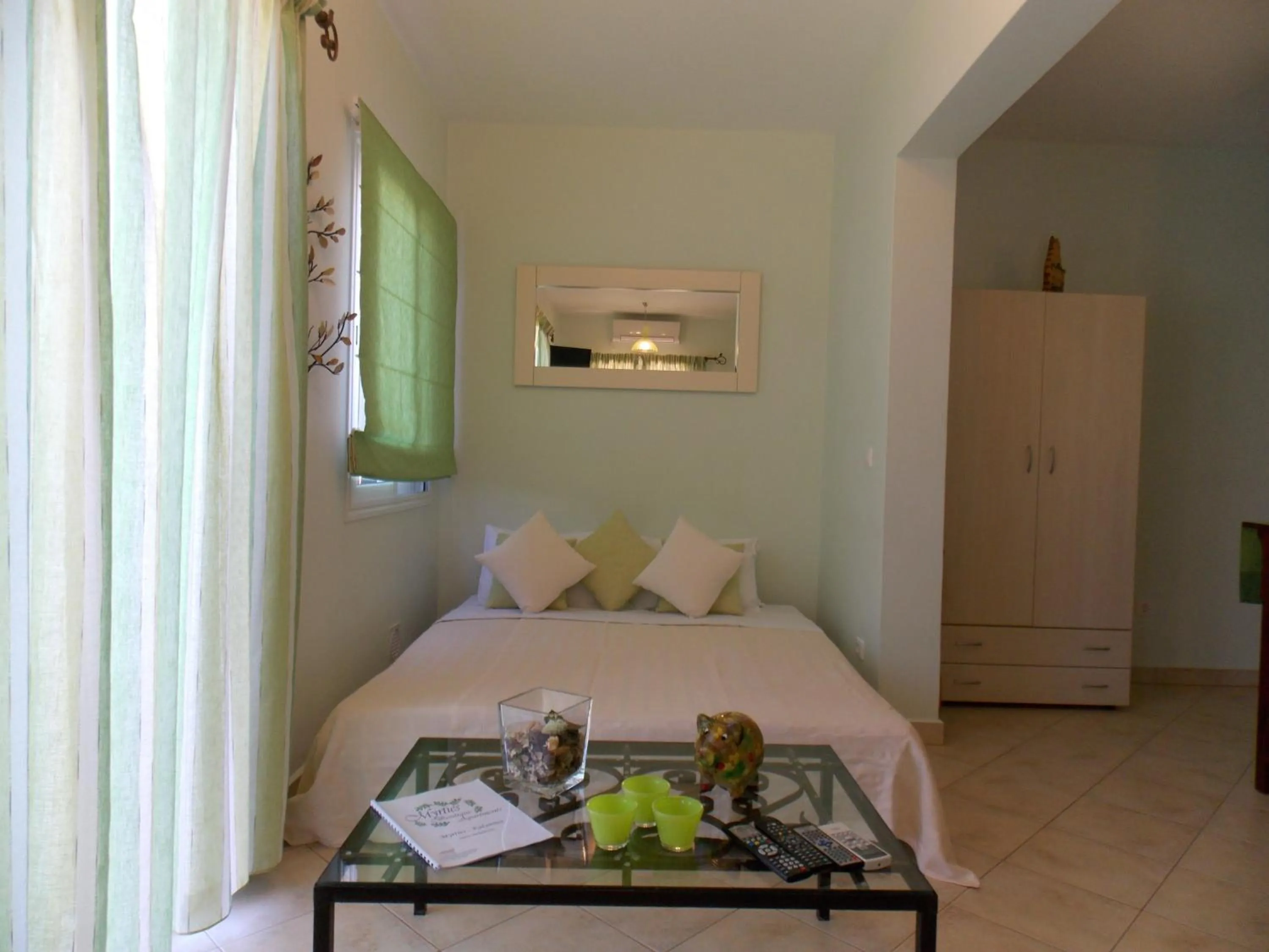 Bed in Myrties Boutique Apartments