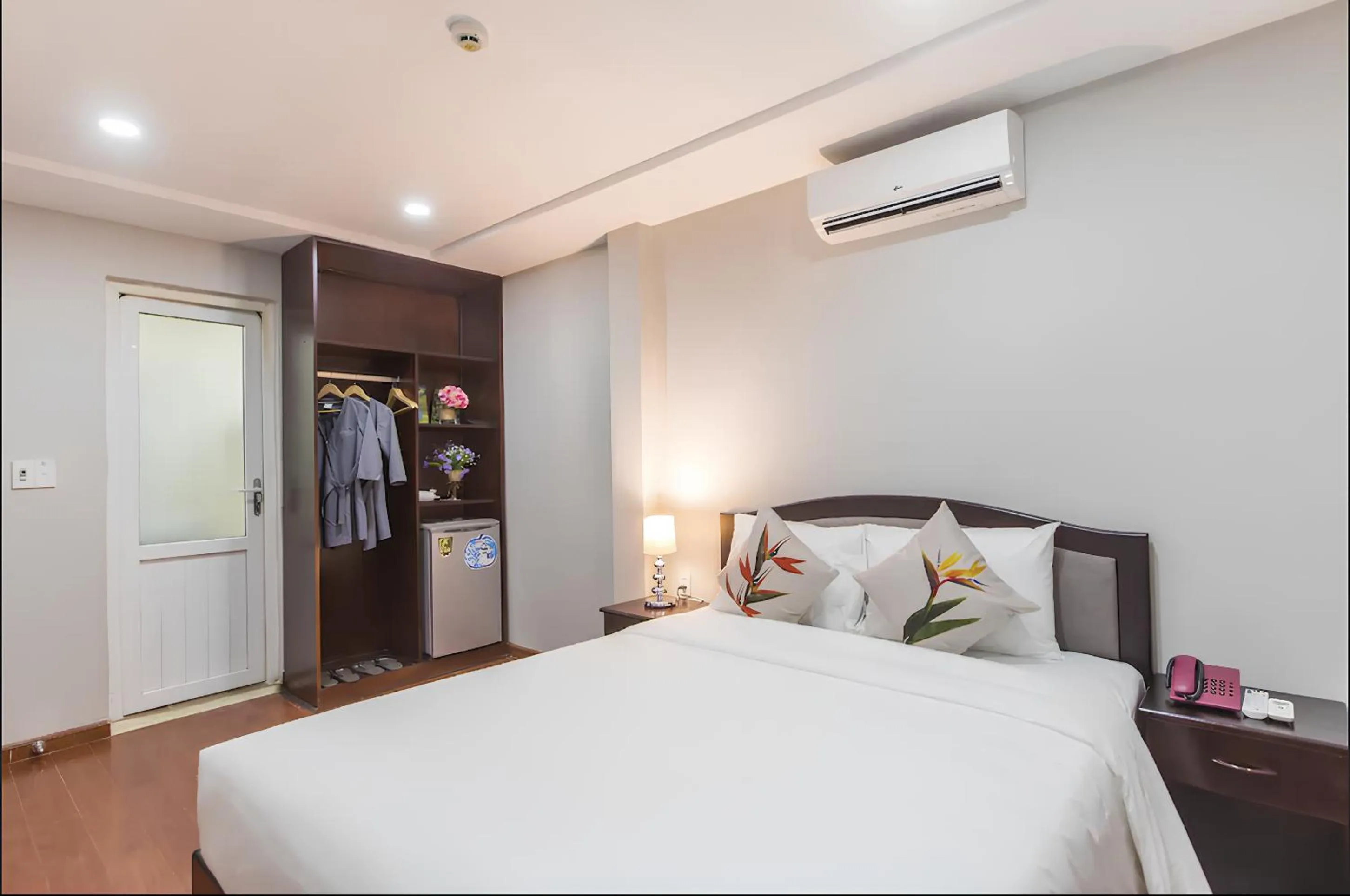 Bed in Binh Duong Resident Hotel