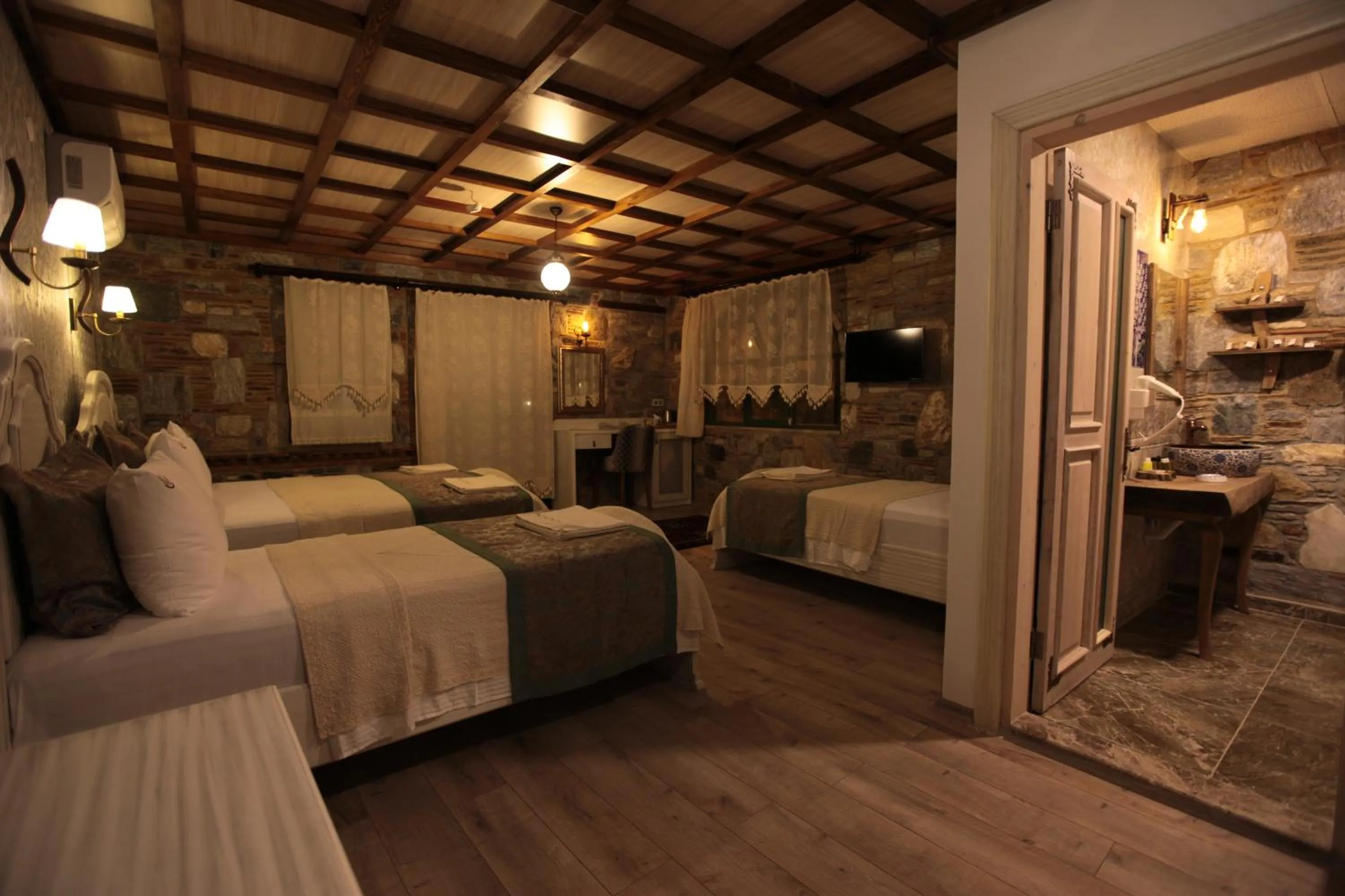 Bed in Celsus Boutique Hotel