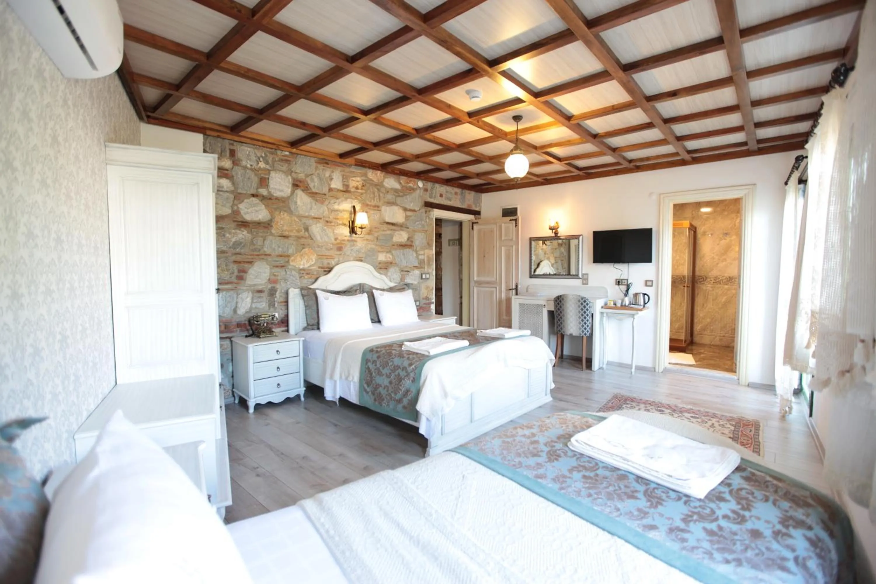 Bed in Celsus Boutique Hotel