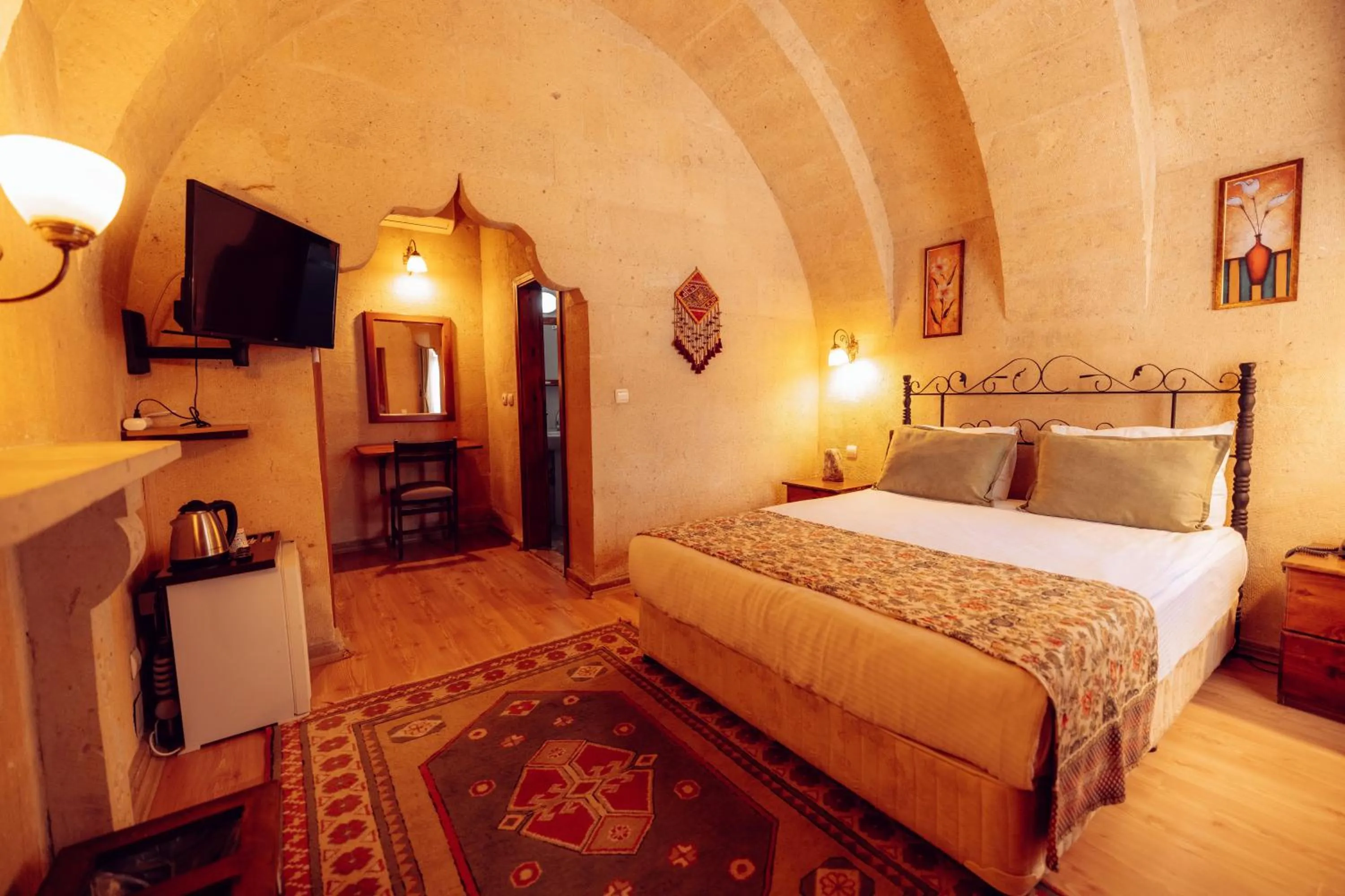 Bed in Melis Cave Hotel