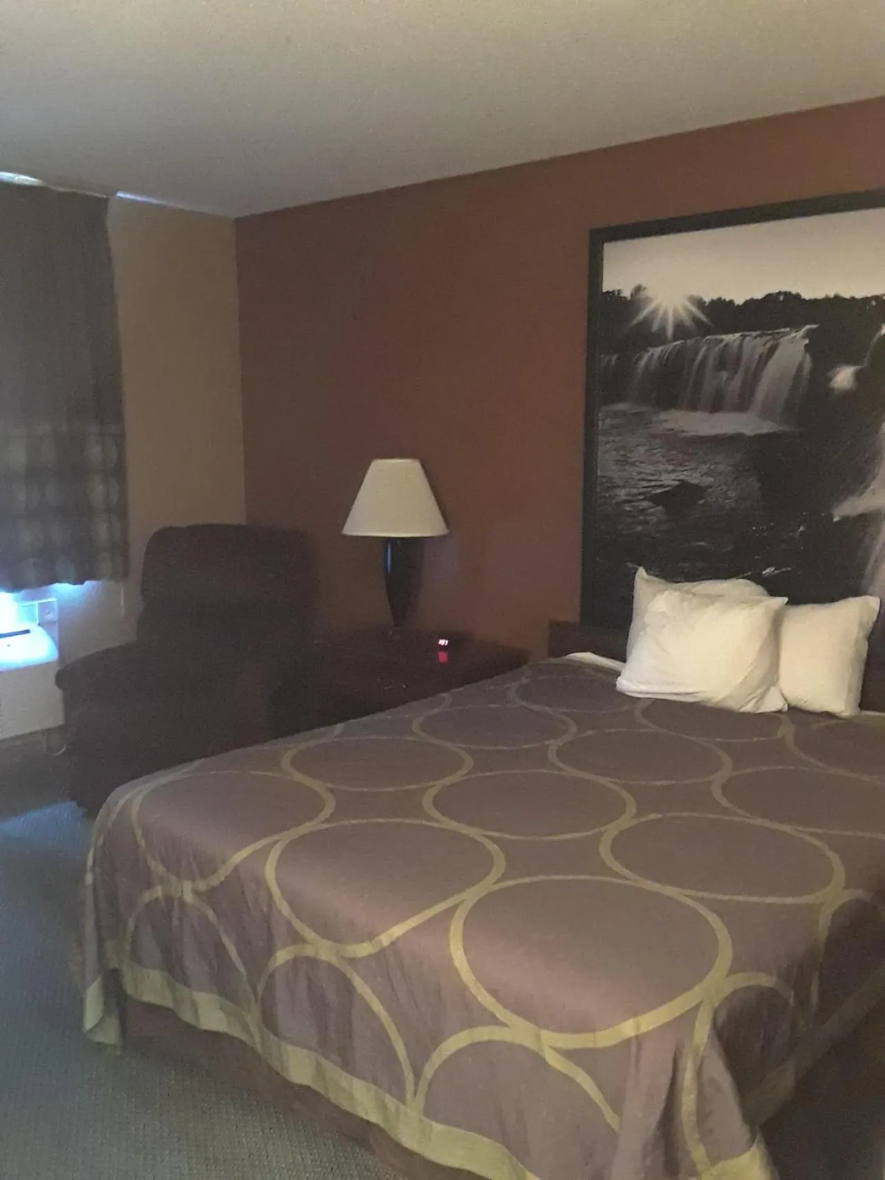 Bed in Super 8 by Wyndham Poplar Bluff Missouri