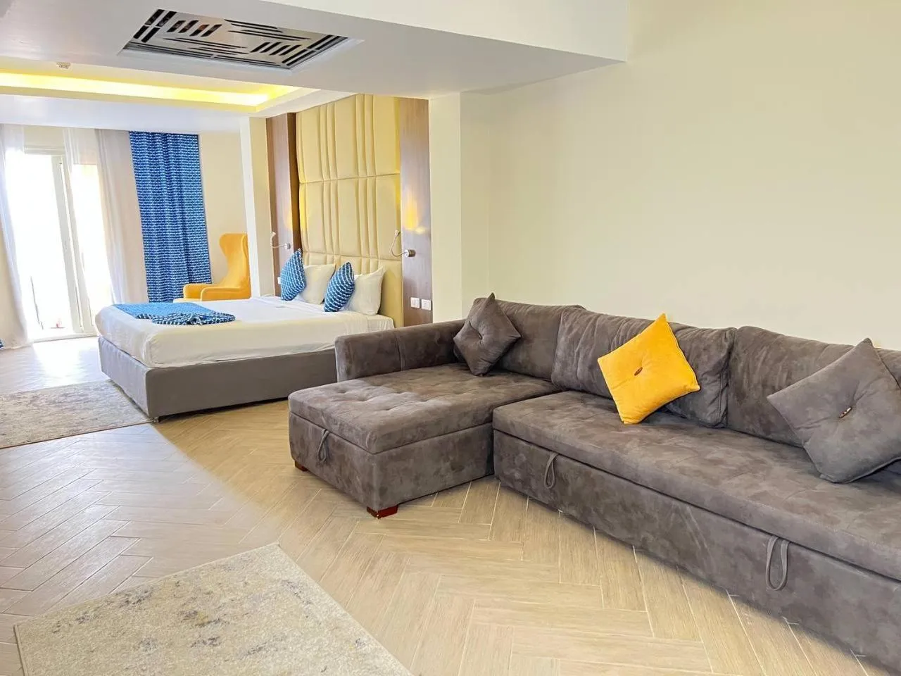 Seating area, Bed in Bellagio Beach Resort & Spa