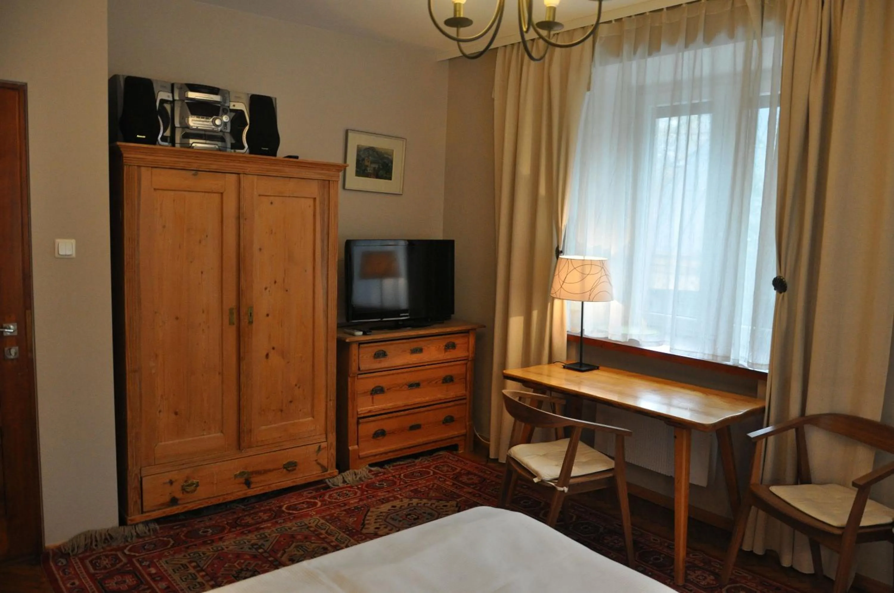 Seating area, Bed in Willa Marma B&B