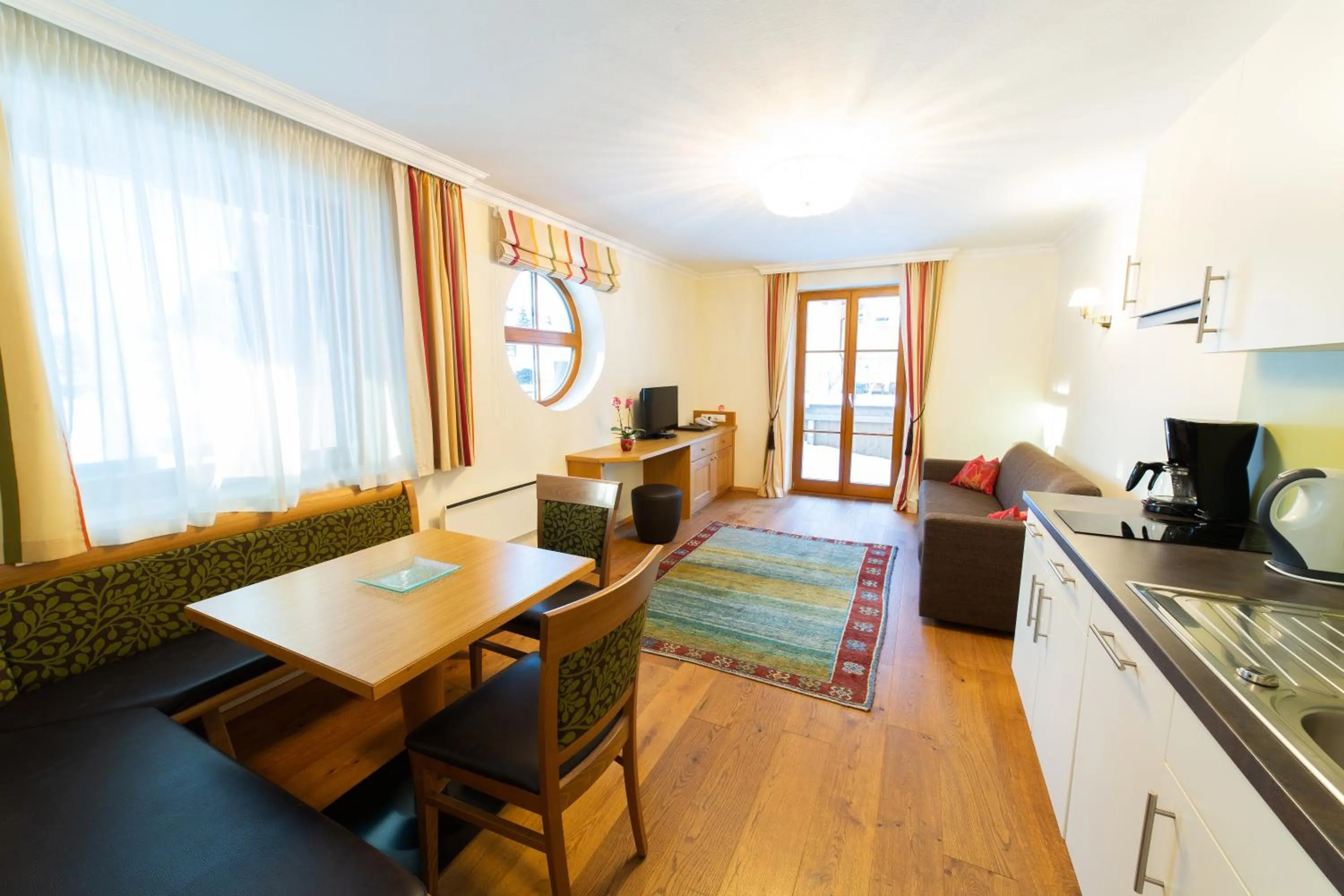 Kitchen or kitchenette in Aparthotel Hirschenau