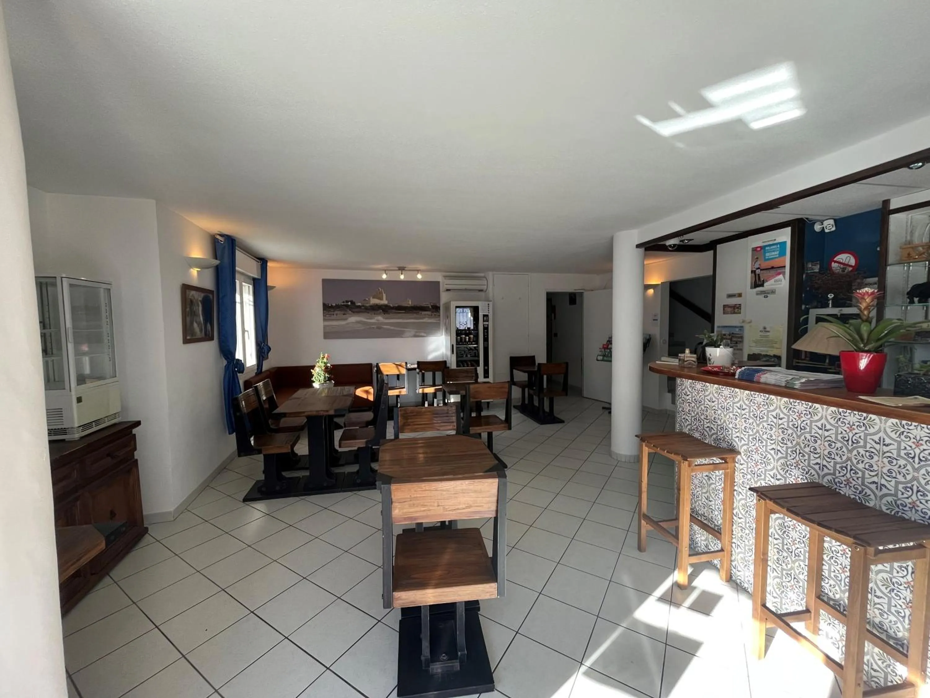 Living room in Hôtel Les Arcades