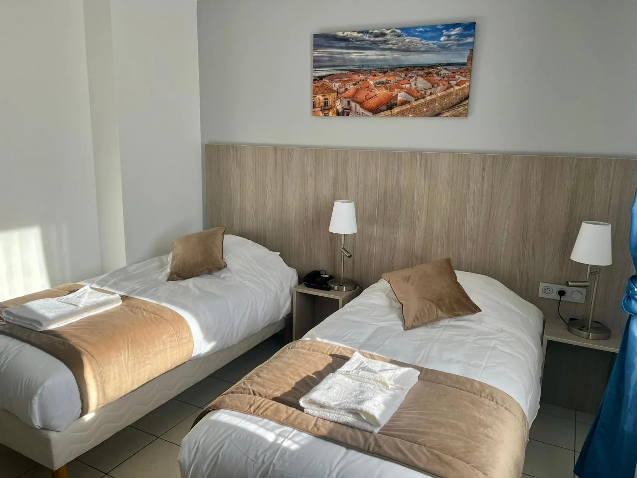 Photo of the whole room, Bed in Hôtel Les Arcades