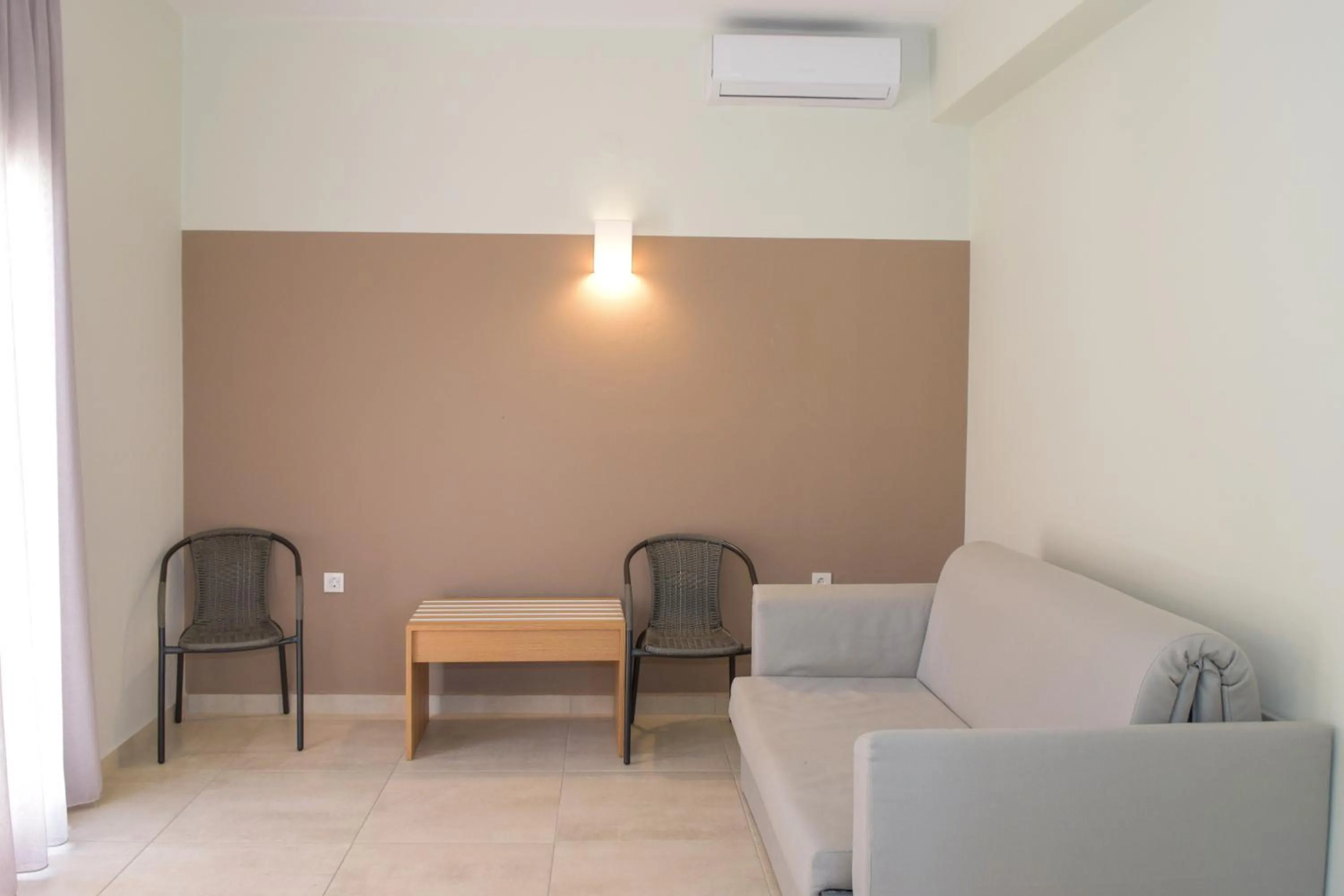 Living room in Mithos Premium Rooms