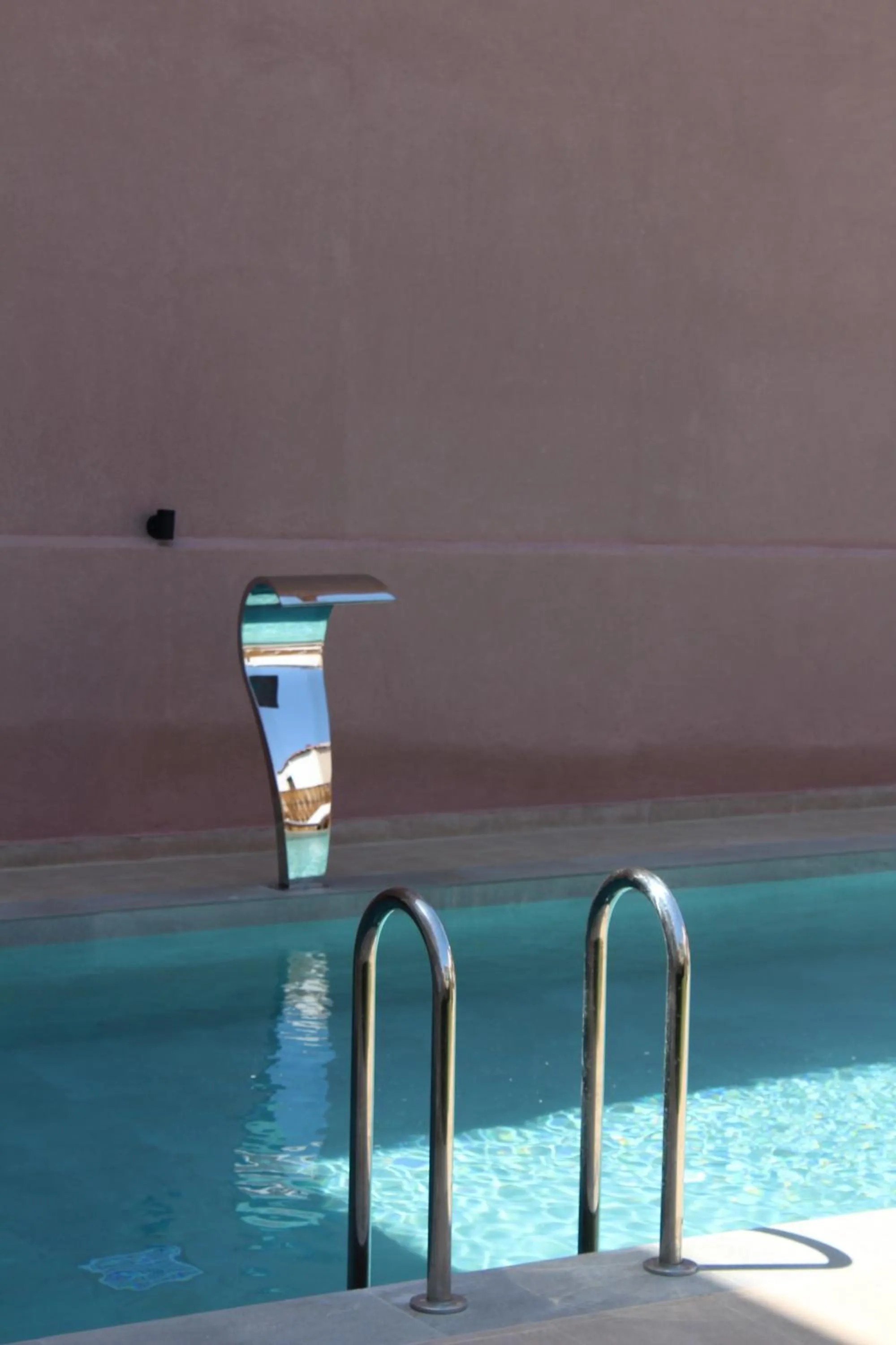 Pool view in Mithos Premium Rooms