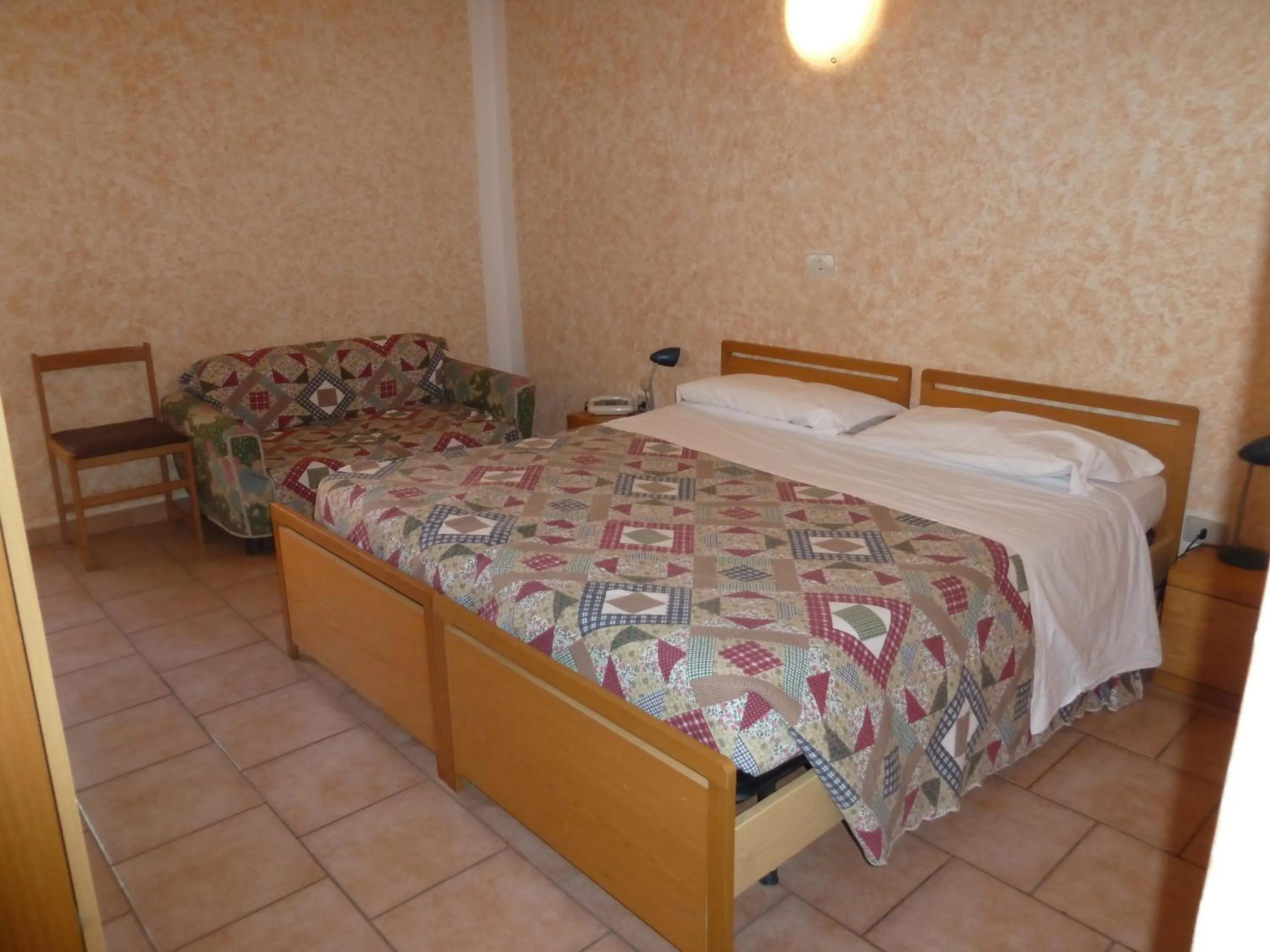 Bed in Hotel Bolognese