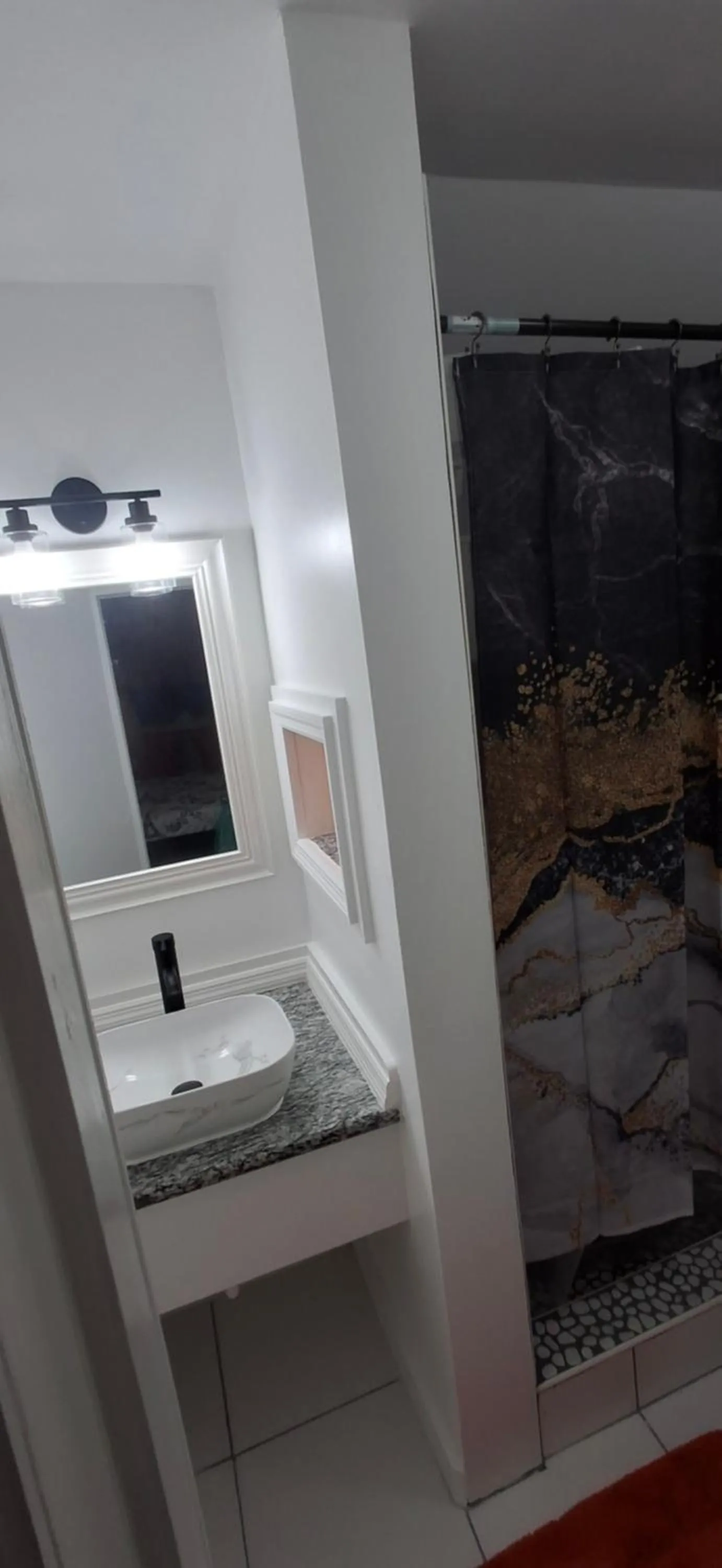 Bathroom in BELL At The Airport Suites Adults Only - Free Airport Transportation