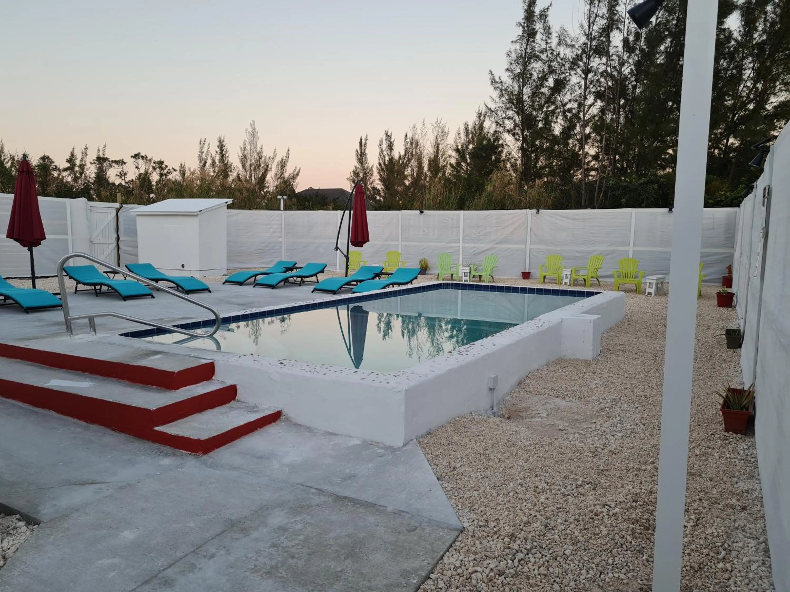 Swimming pool in BELL At The Airport Suites Adults Only - Free Airport Transportation