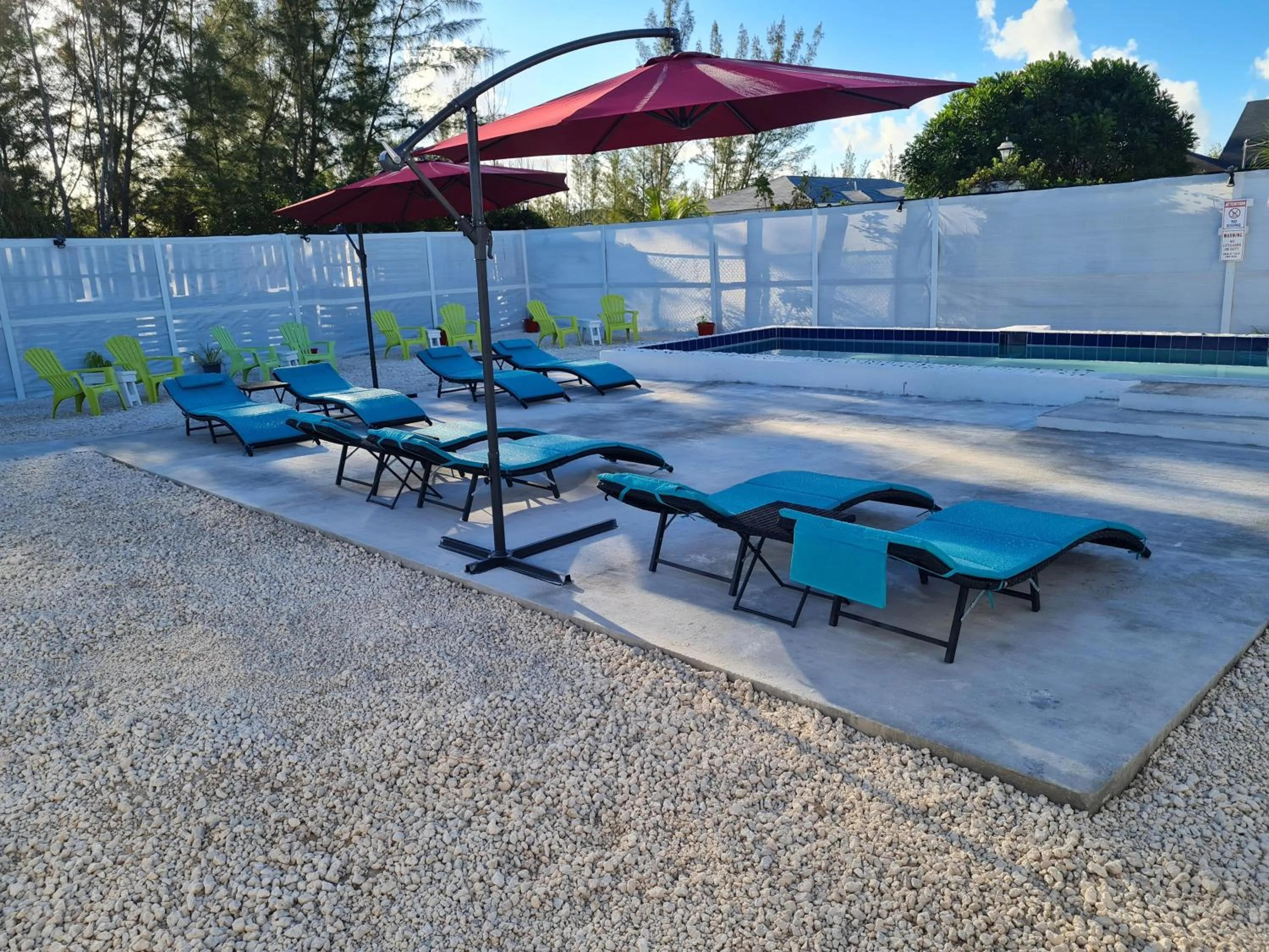 Swimming pool in BELL At The Airport Suites Adults Only - Free Airport Transportation