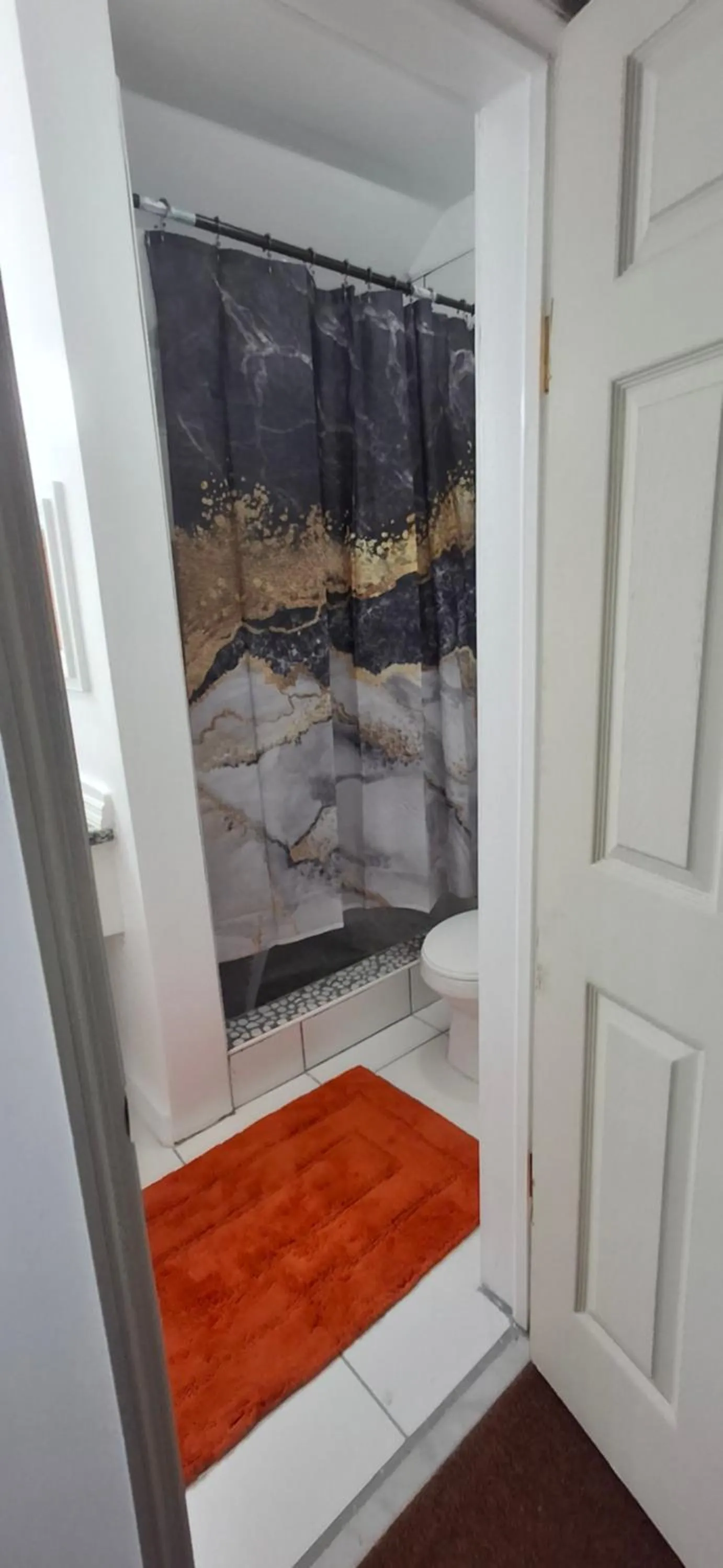Shower in BELL At The Airport Suites Adults Only - Free Airport Transportation
