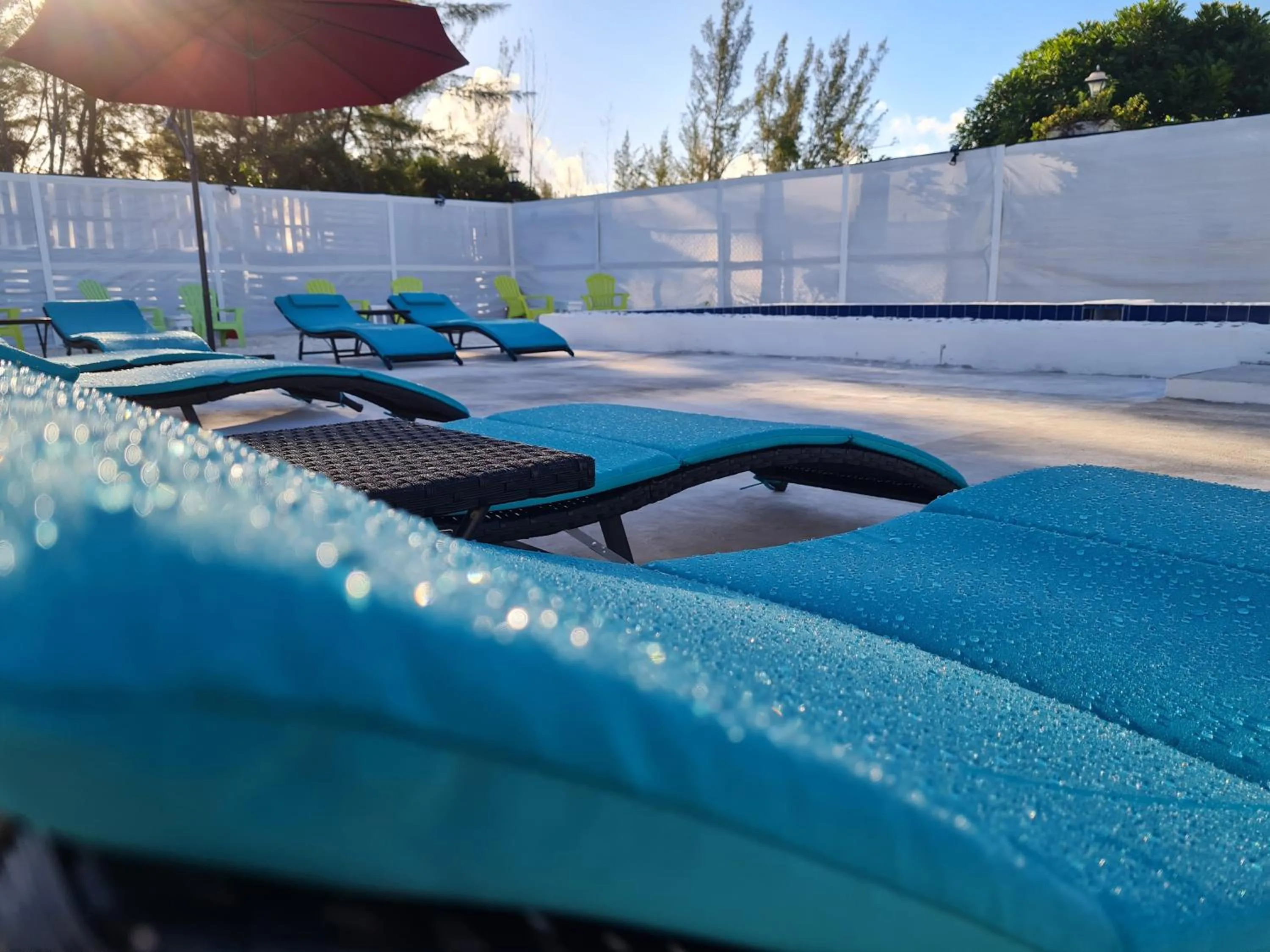 Swimming pool in BELL At The Airport Suites Adults Only - Free Airport Transportation