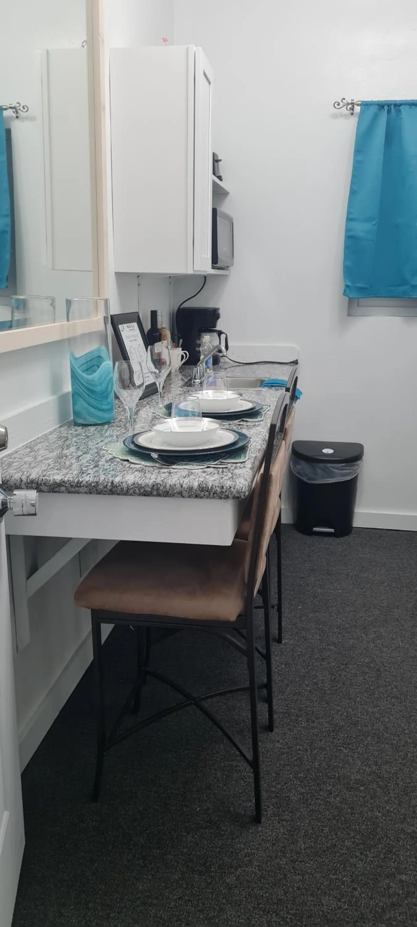 Kitchen or kitchenette in BELL At The Airport Suites Adults Only - Free Airport Transportation