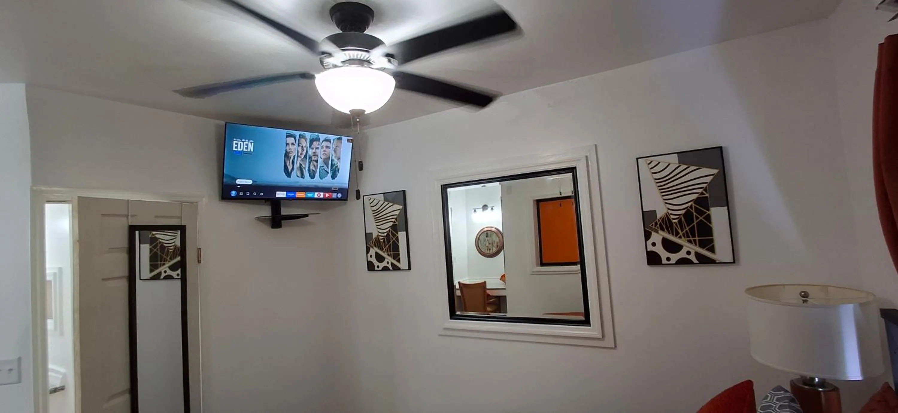 TV and multimedia in BELL At The Airport Suites Adults Only - Free Airport Transportation