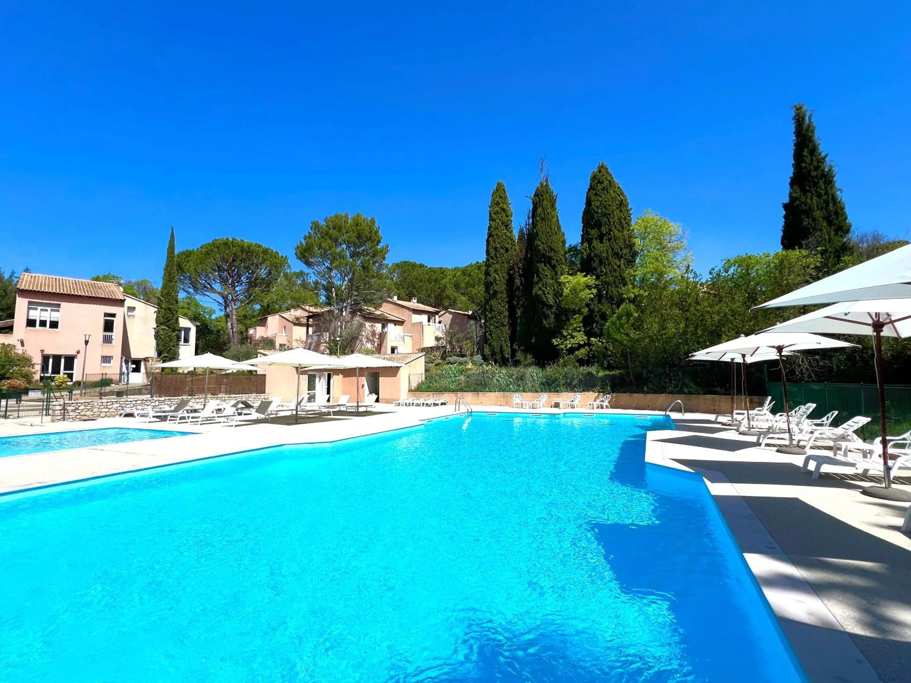 Swimming pool in Village vacances Le Hameau des Oliviers